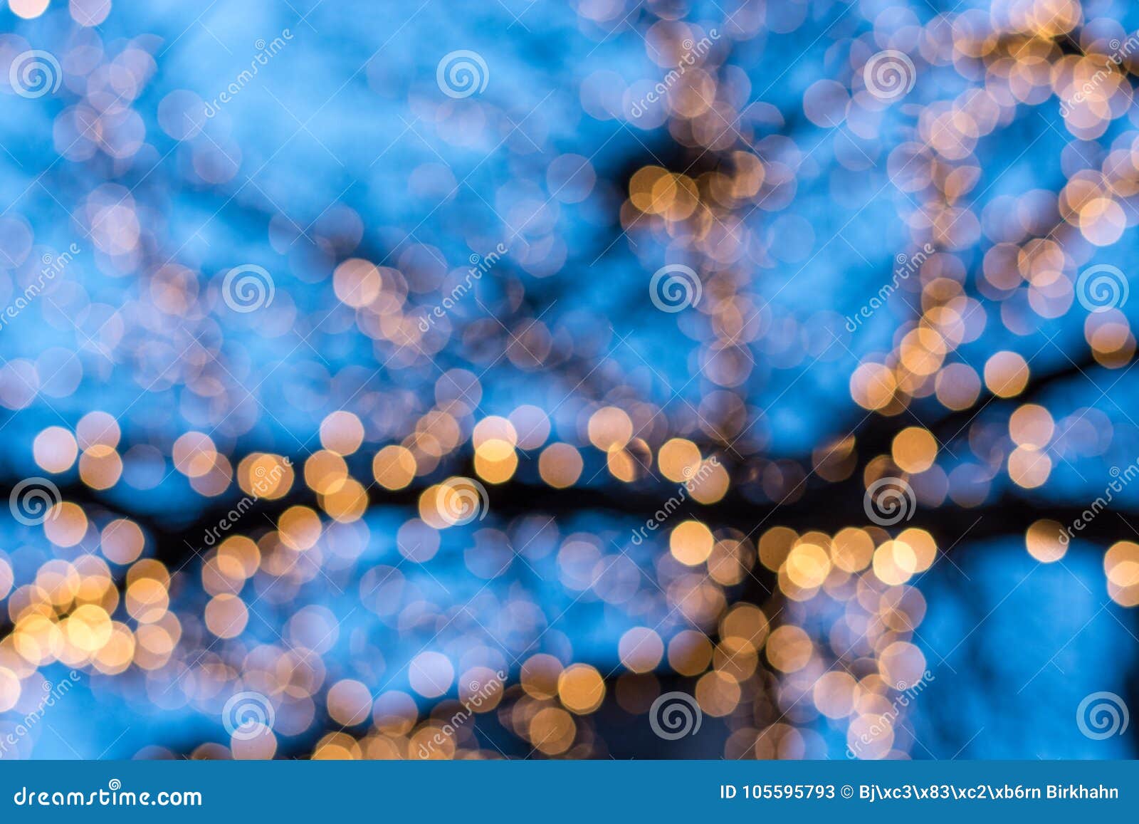 Blurred Christmas Tree Lights with Blue Sky Stock Image Image of