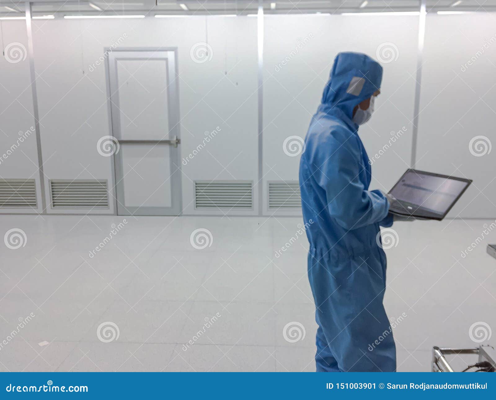 Blurred Engineer Inside Clean Room Class 1000 With Emergency
