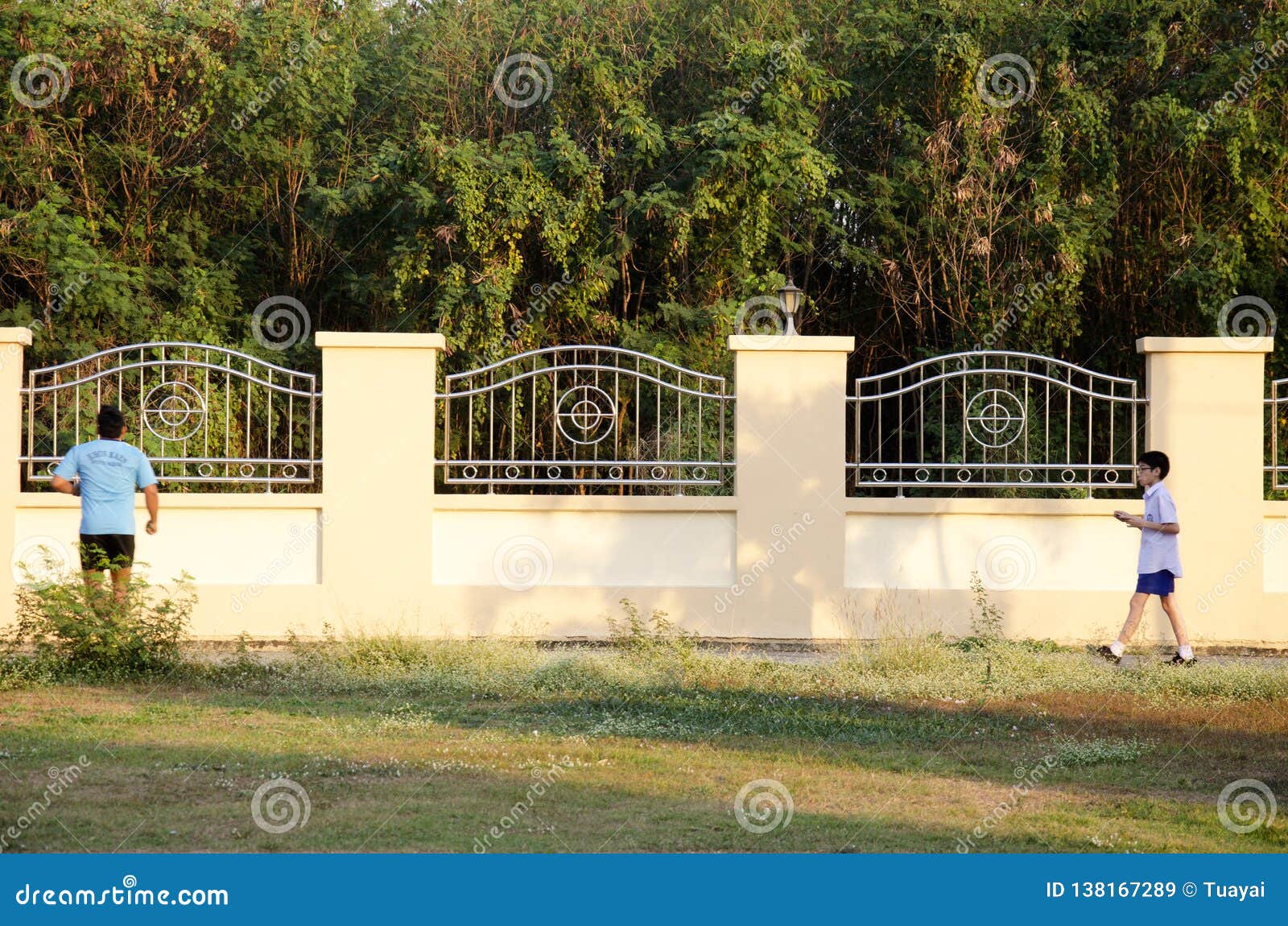 Asian Thai People Running Jogging and Exercise in Dusk Time at