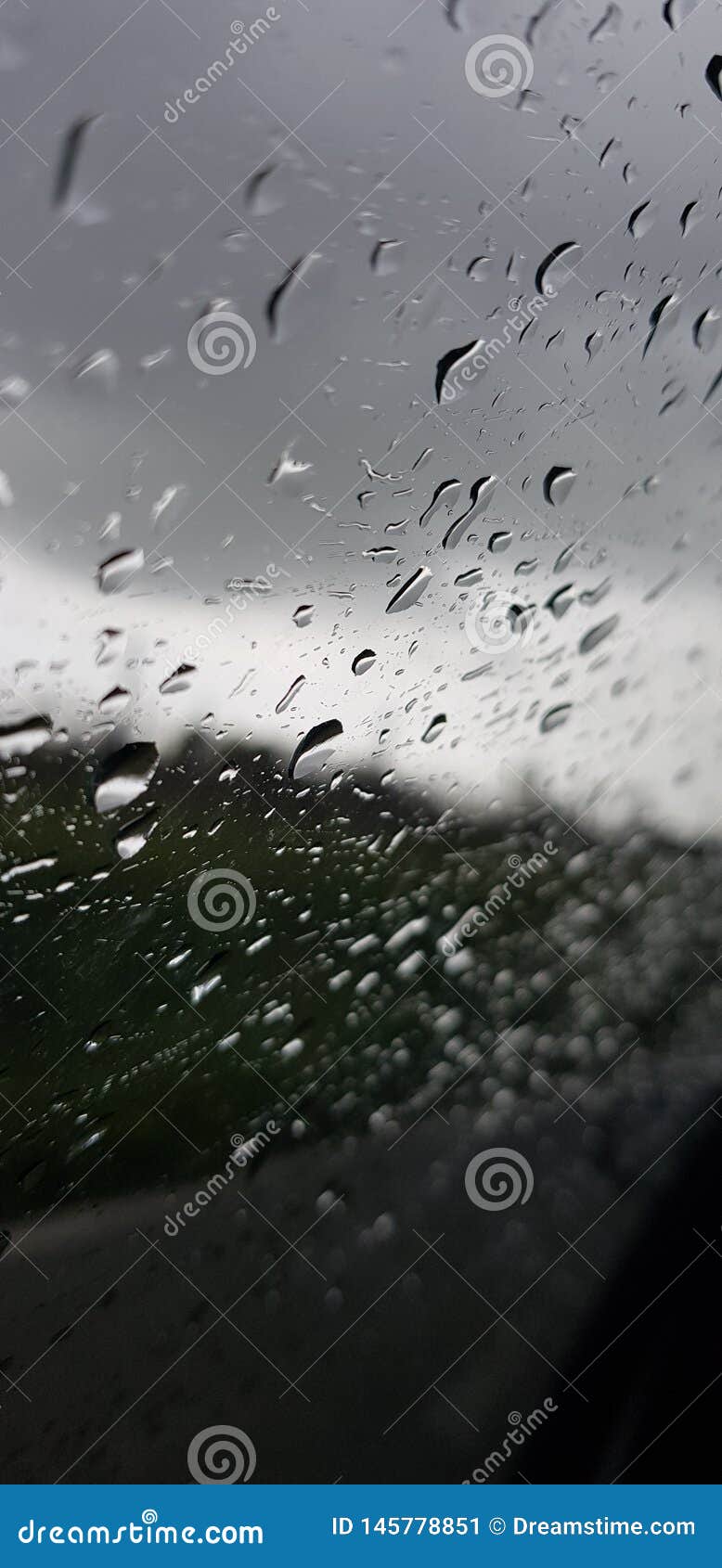 blurred rain on glass -phone wallpaper-