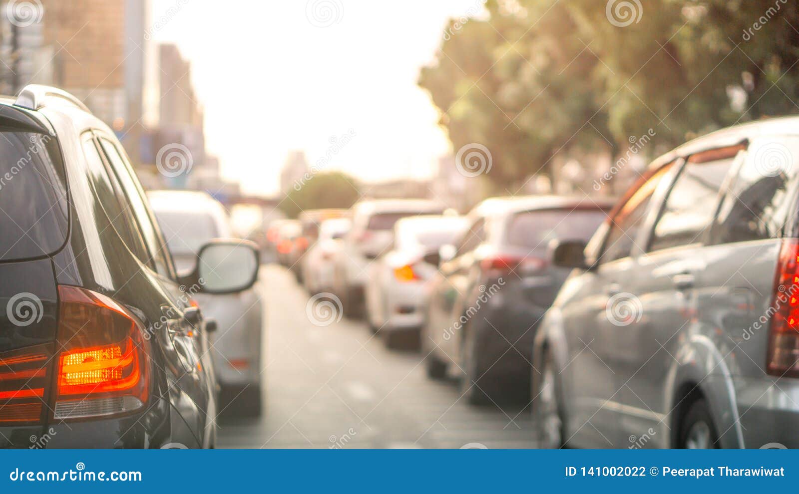 blurred row of car on evening treaffic jam hour in bangkok thailad and copyspace, use for city and car traffic problem content