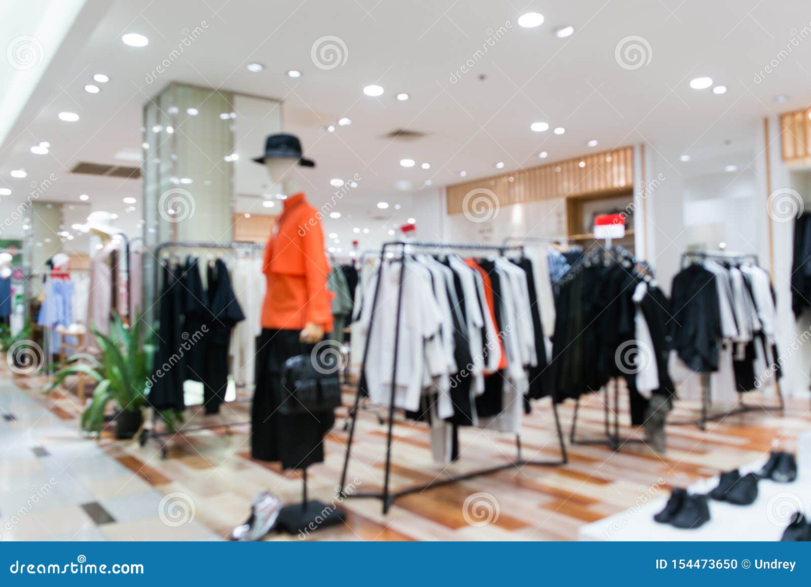 blurred showcases fashion boutique clothing store in a modern shopping mall. cloth and acessorie modern shop blur