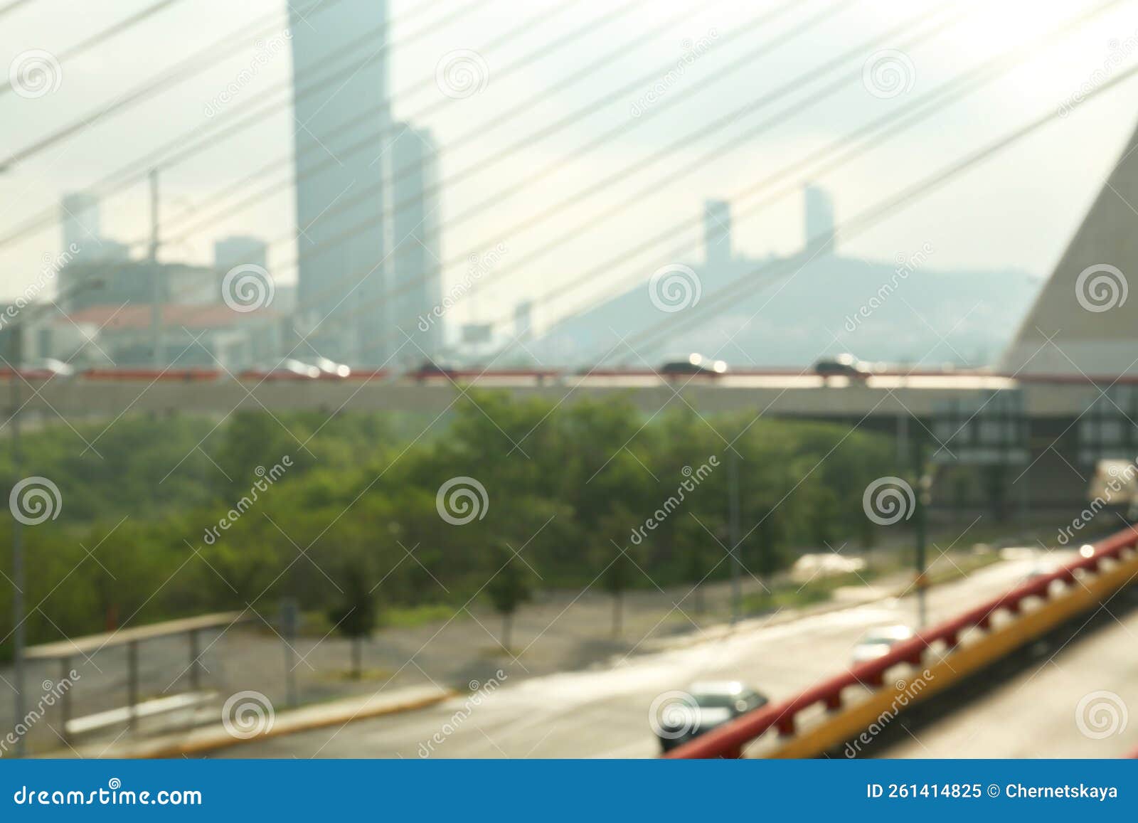 blurred view of cars on modern bridge