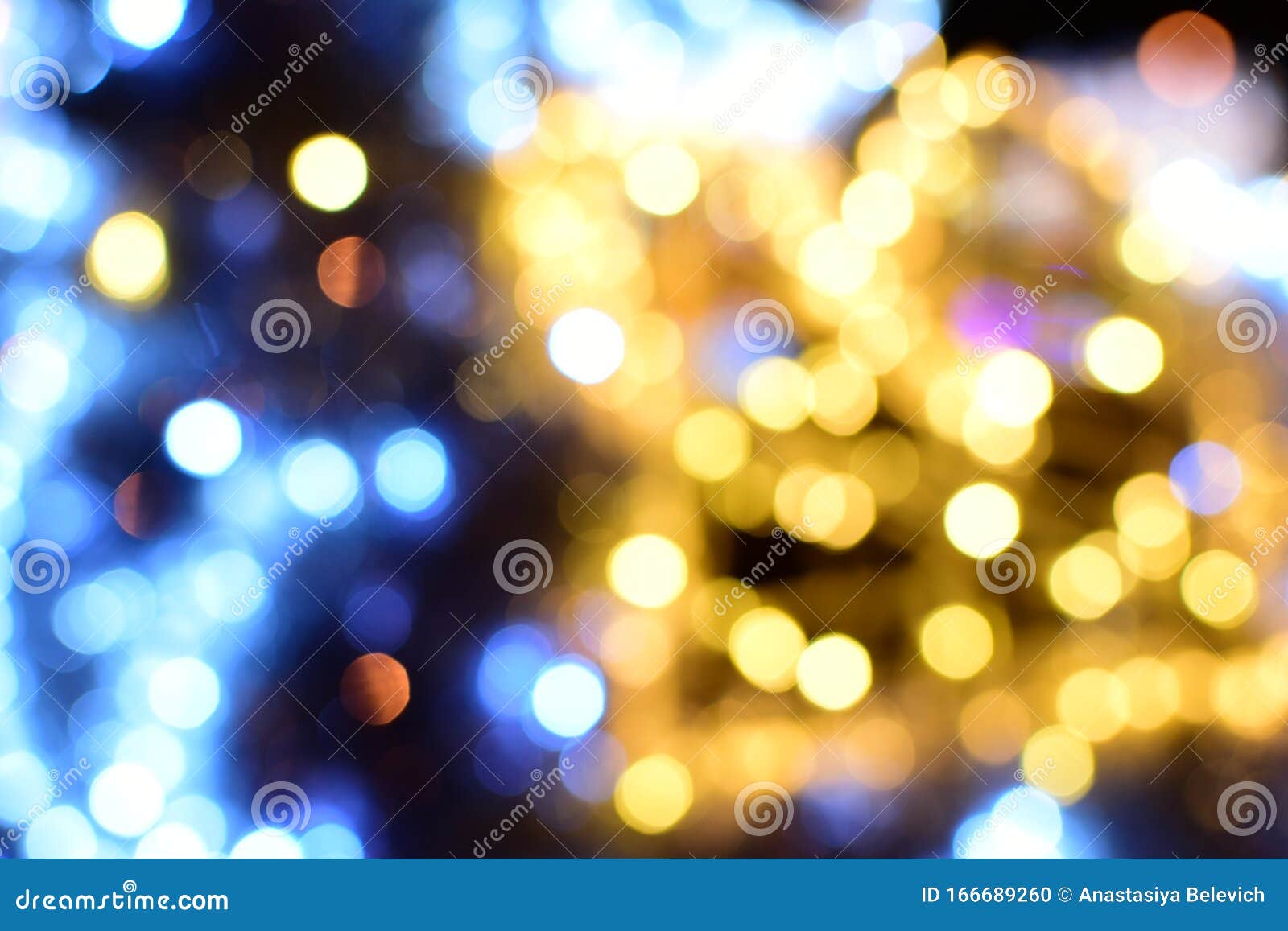 Blurry Christmas Lights of the Night City. Copy Space Stock Photo