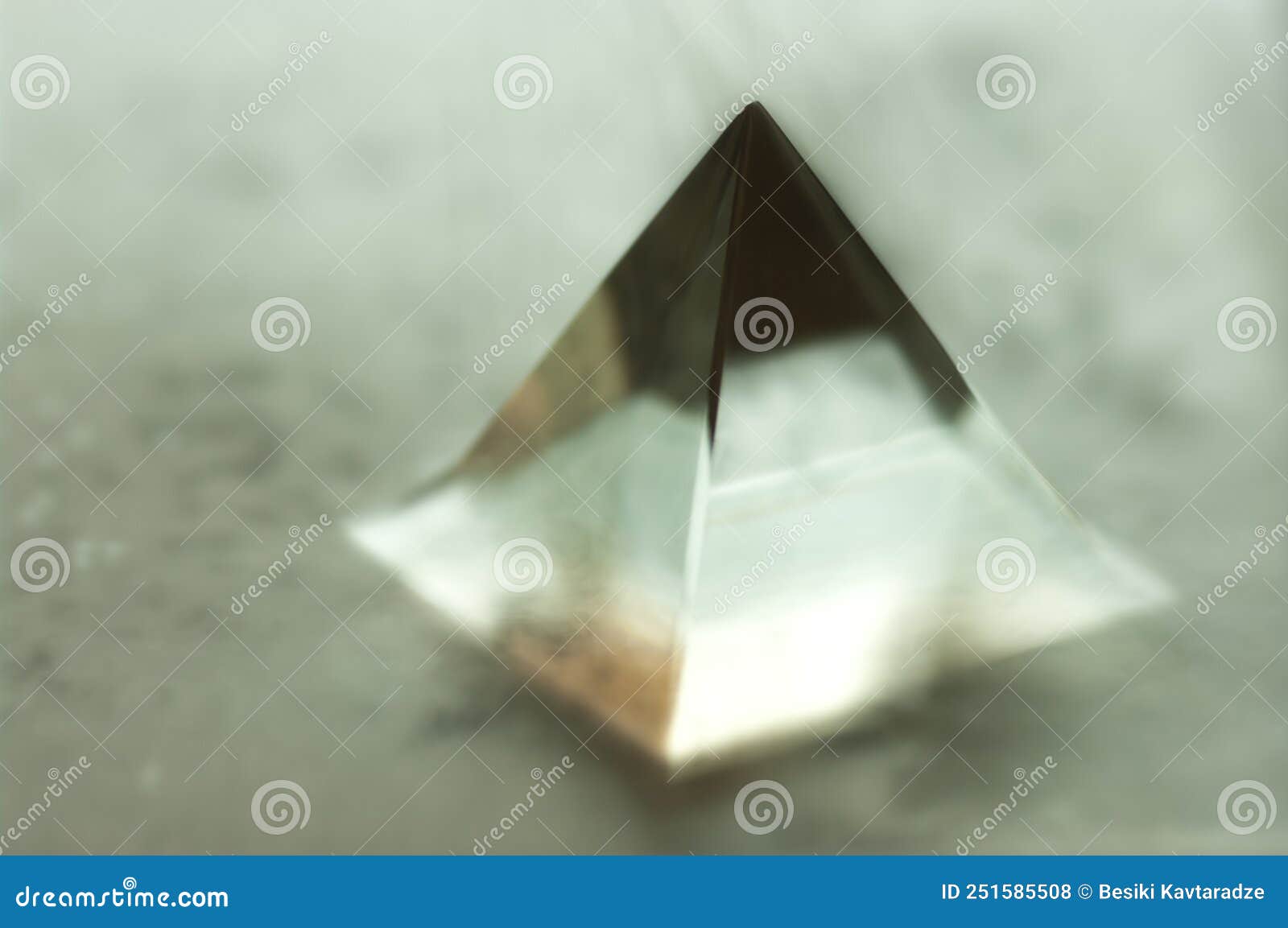 Copper pyramid with lighting, with antique glass vase and stones