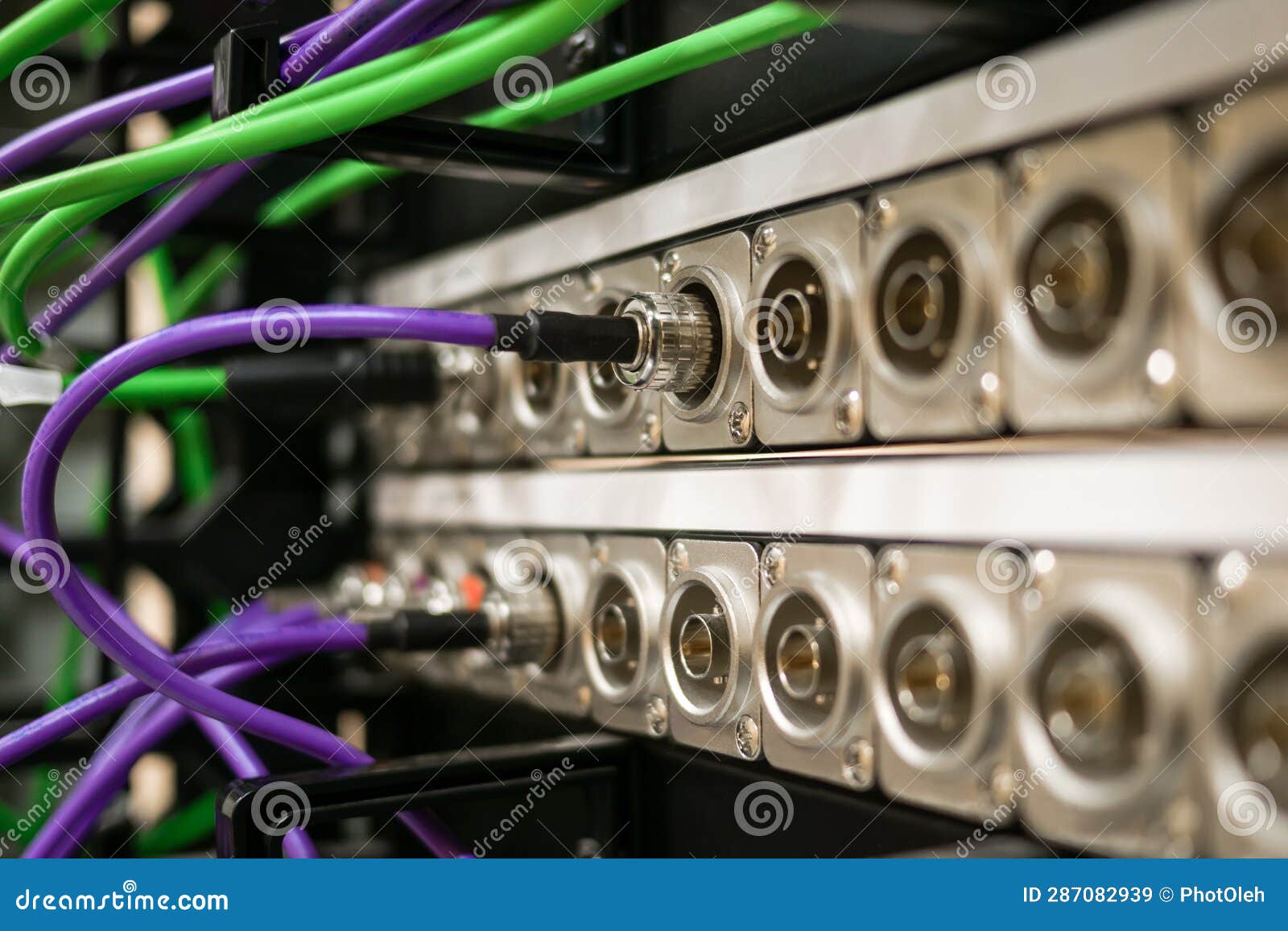 bnc patch panel with connected coaxial sdi cables