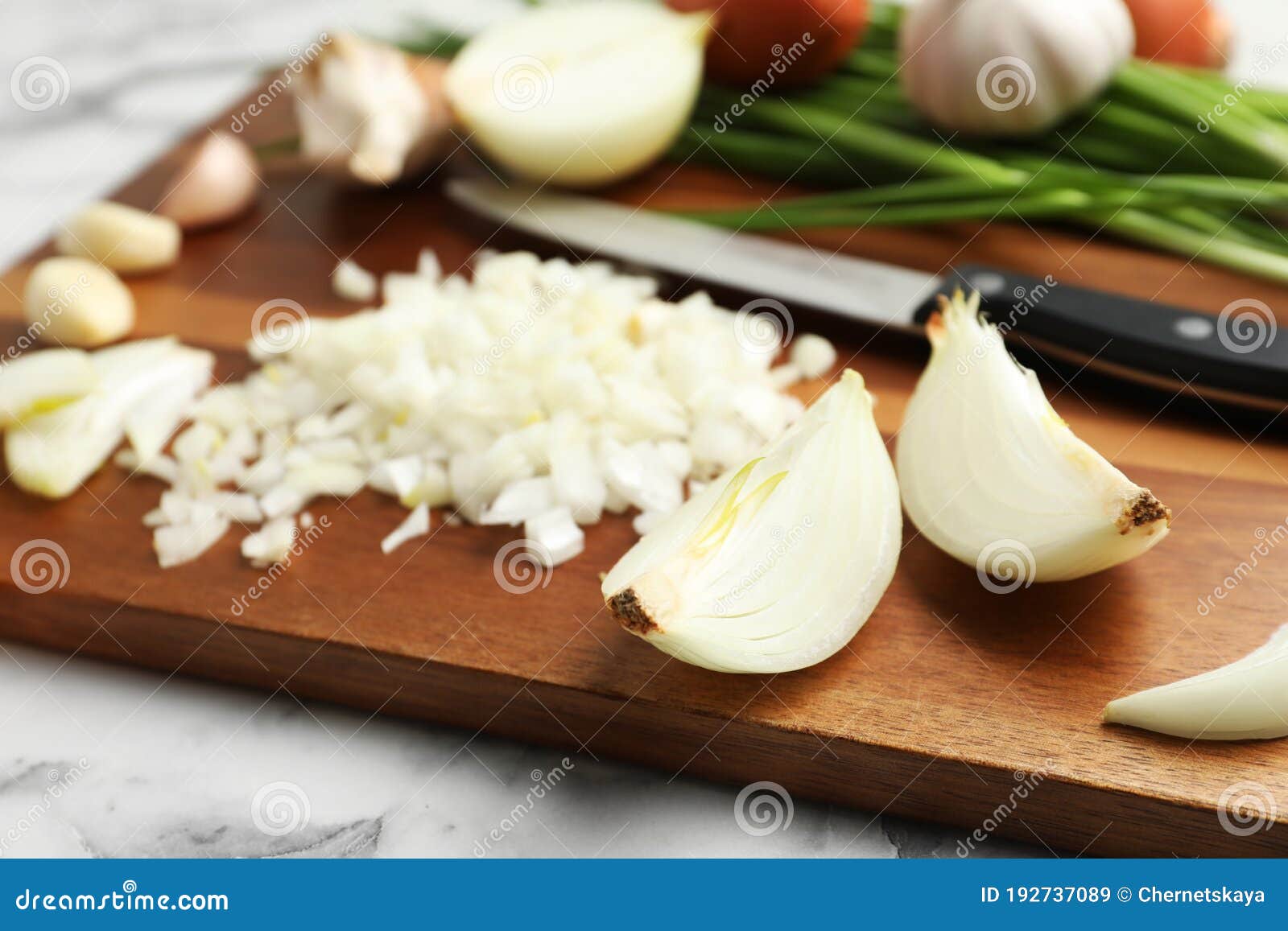 Board with Cut Onion and Garlic on Table Stock Image Image of product