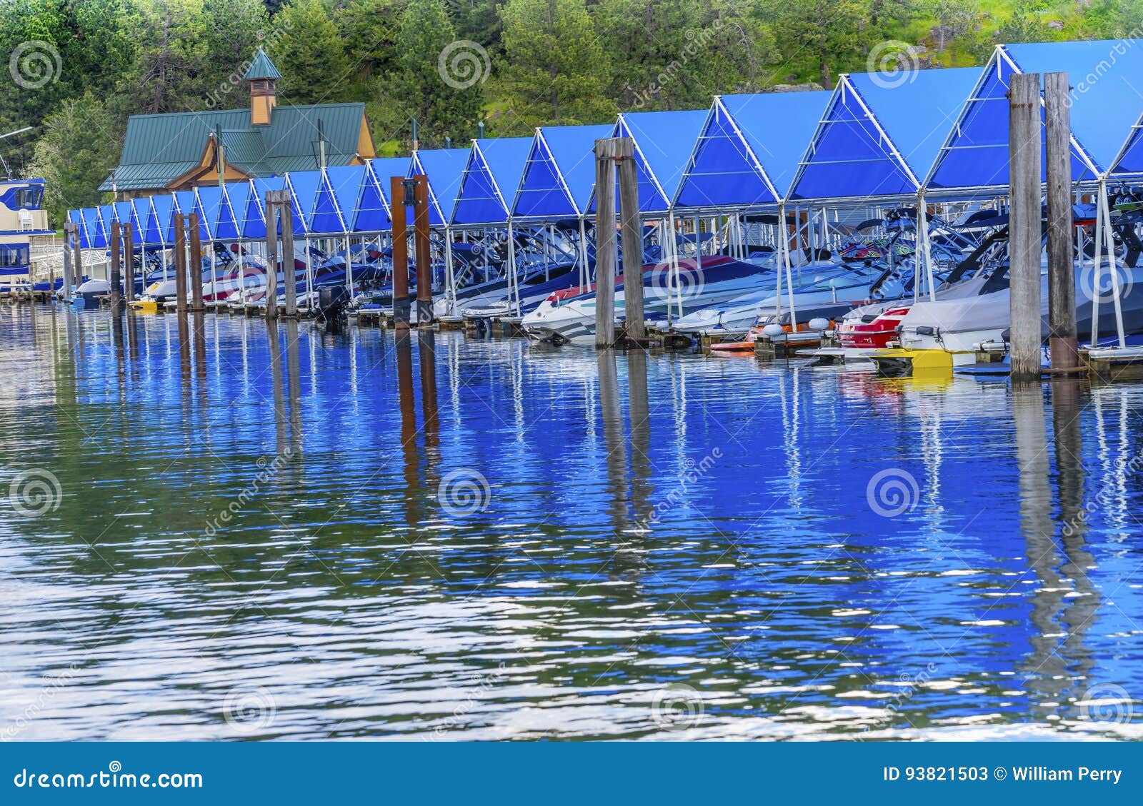 boardwalk marina piers boats reflection lake coeur d`alene idaho