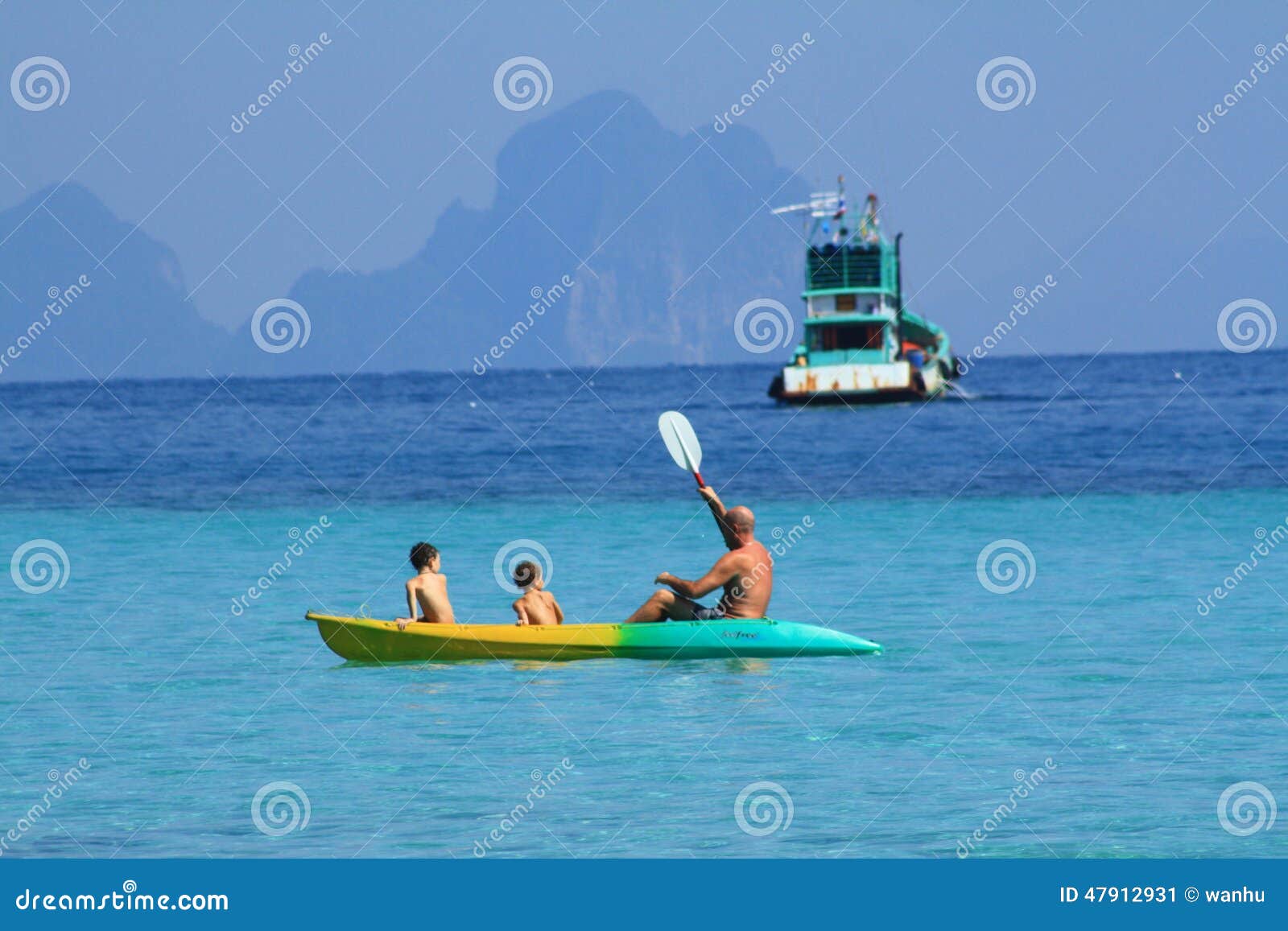 Boat and Canoe on the Blue Sea Editorial Photo Image of water