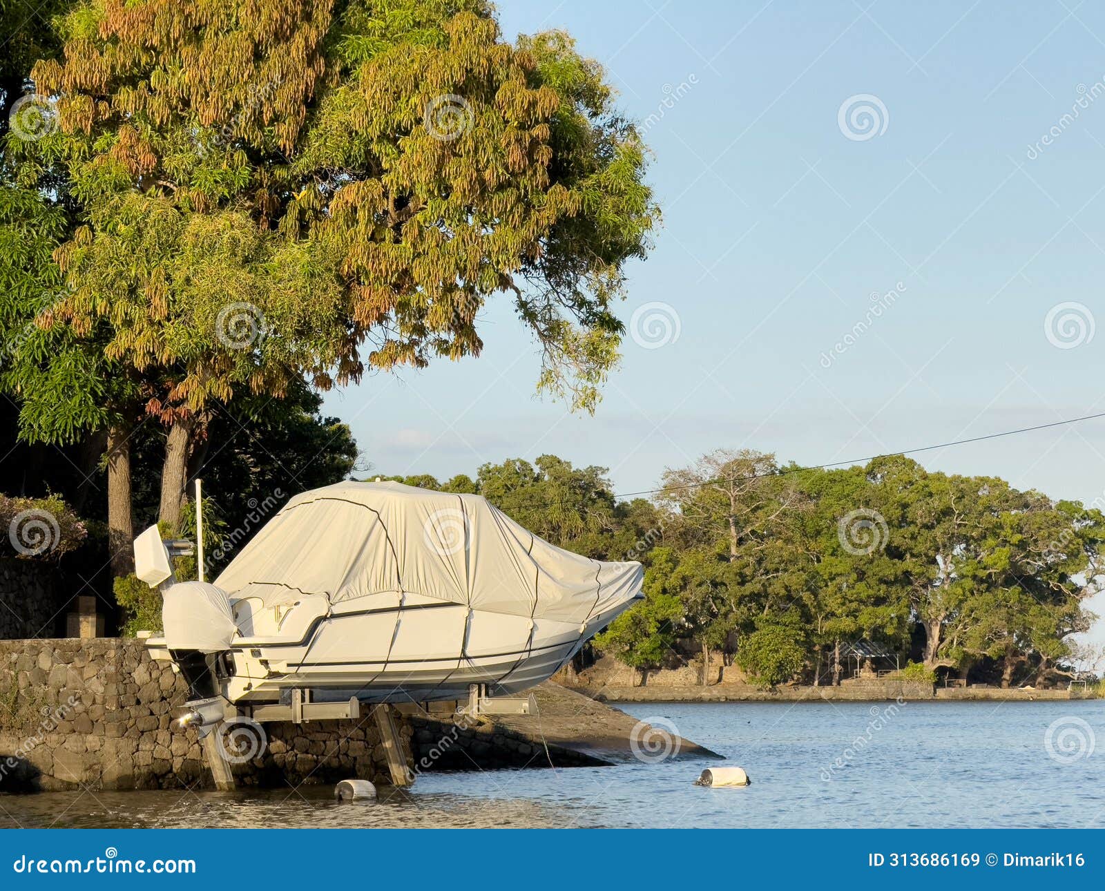 Boat covered for storage stock image. Image of guarding 313686169
