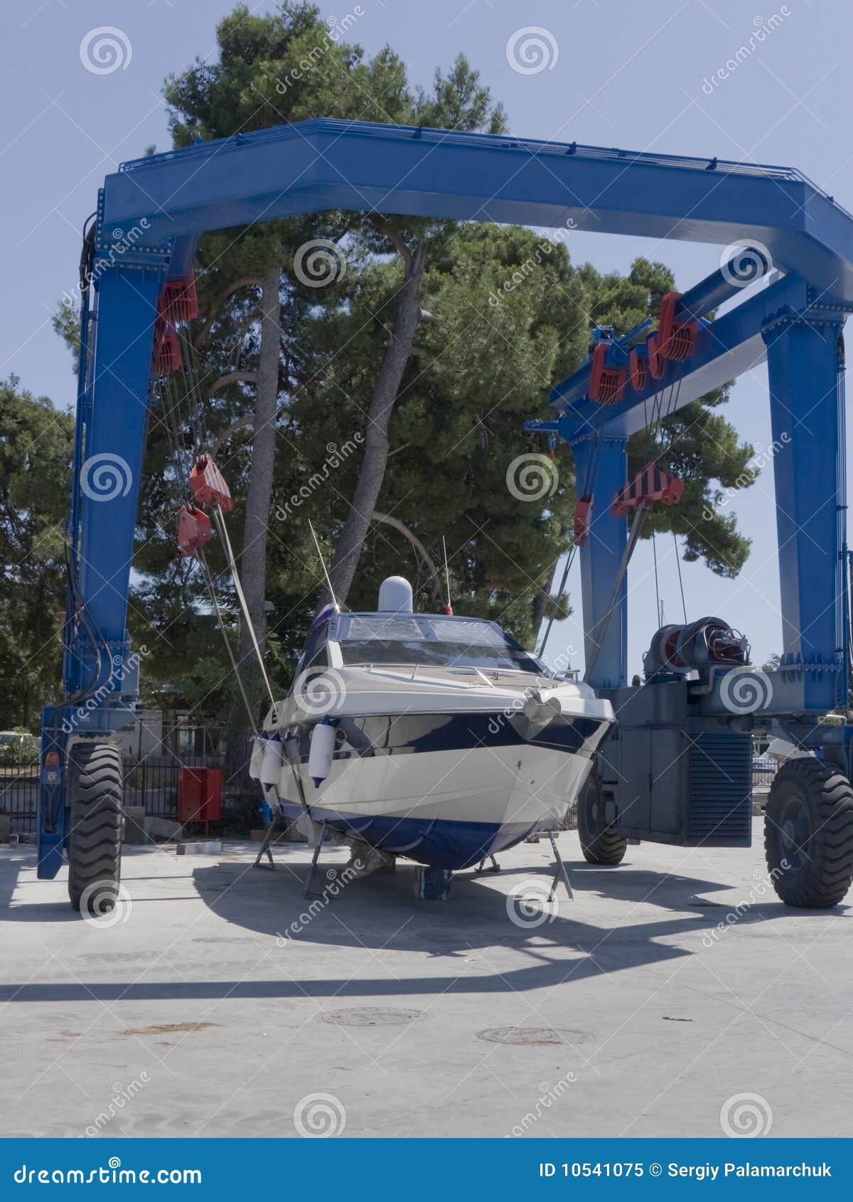 Boat on crane stock image. Image of pleasure, hoist, marina 10541075