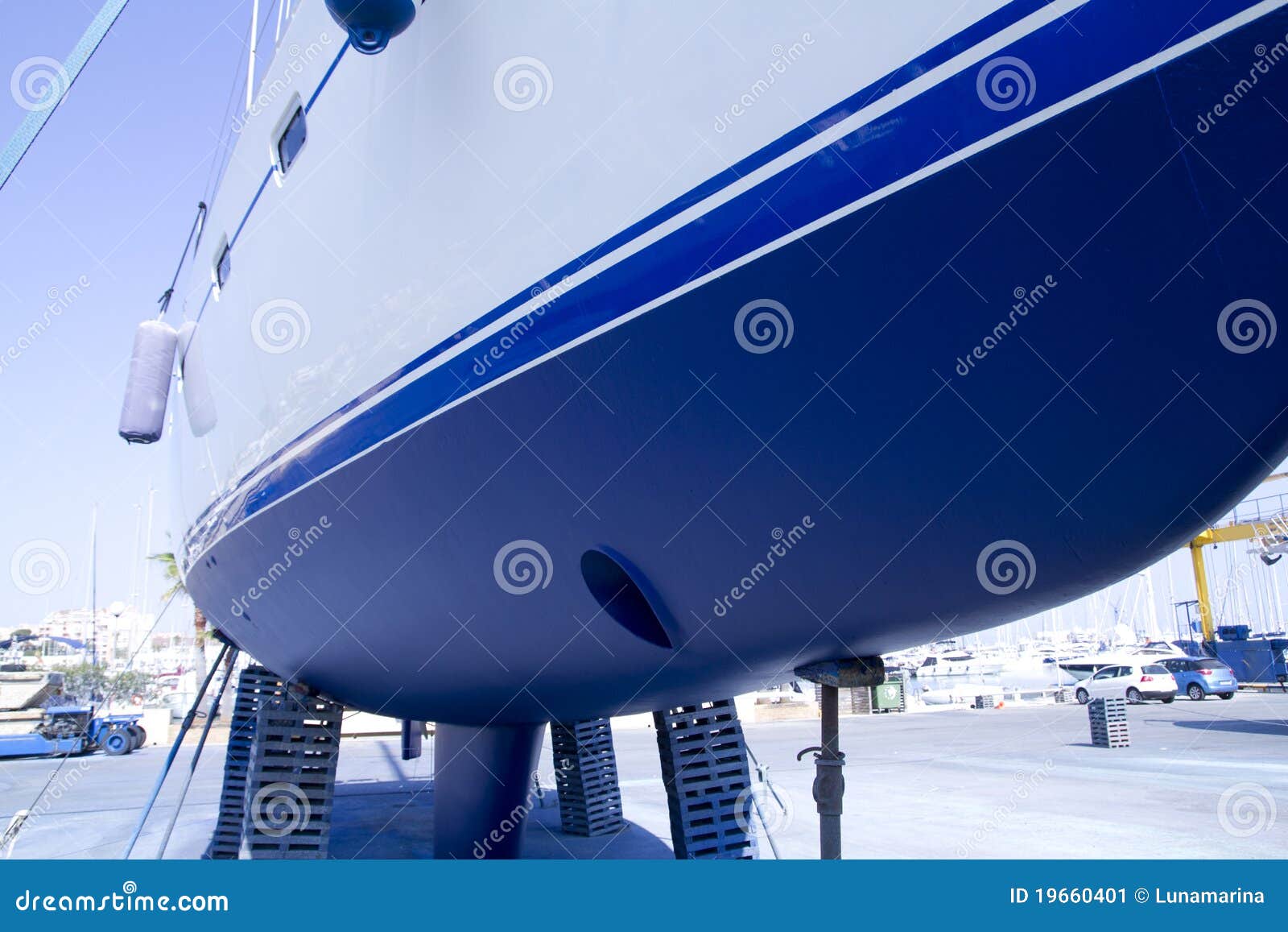 boat hull sailboat blue antifouling beached