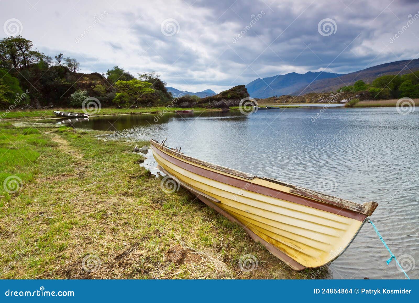 Boat at the Killarney lake stock photo. Image of fishing 24864864