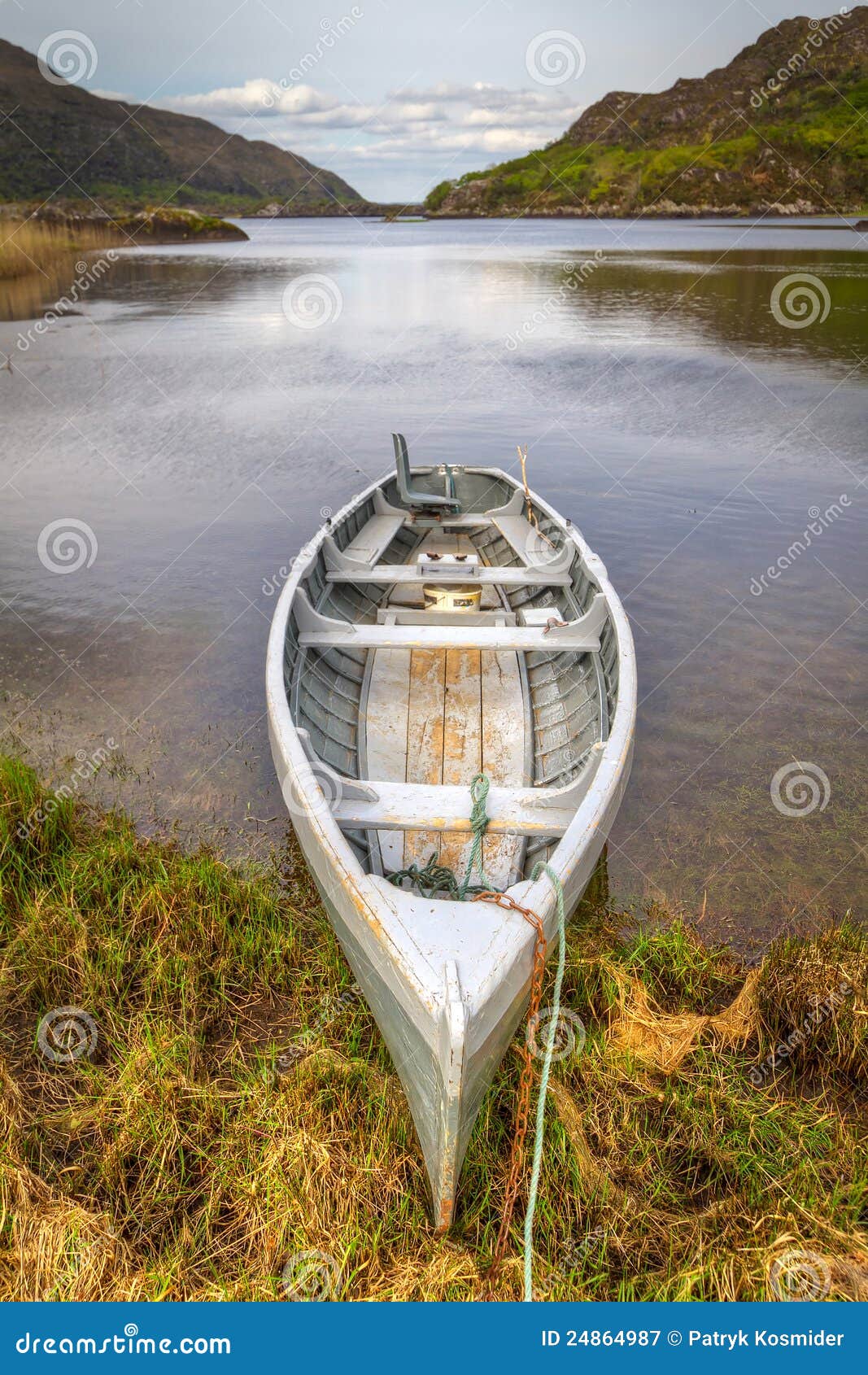 Boat at the Killarney lake stock image. Image of blue 24864987