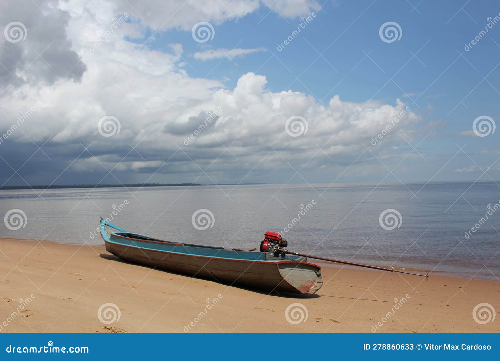 a boat rests on the sands of one of the river beaches