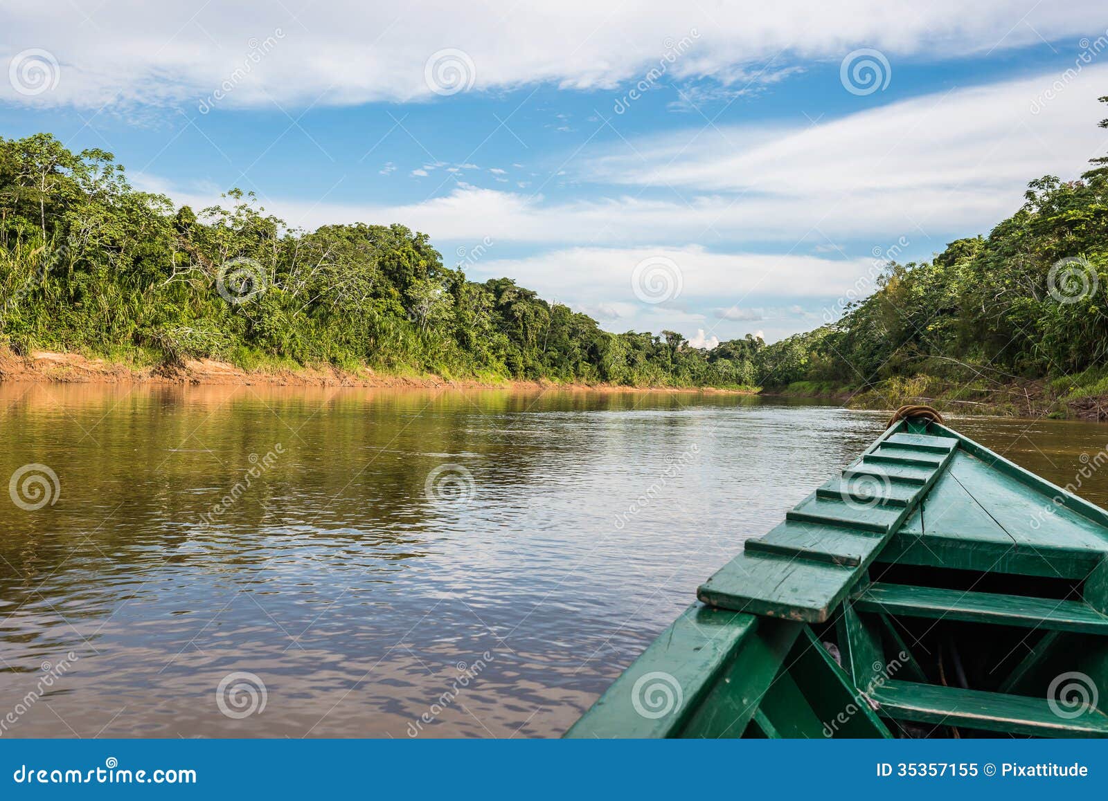 boat in the river in the peruvian amazon jungle at madre de dios peru