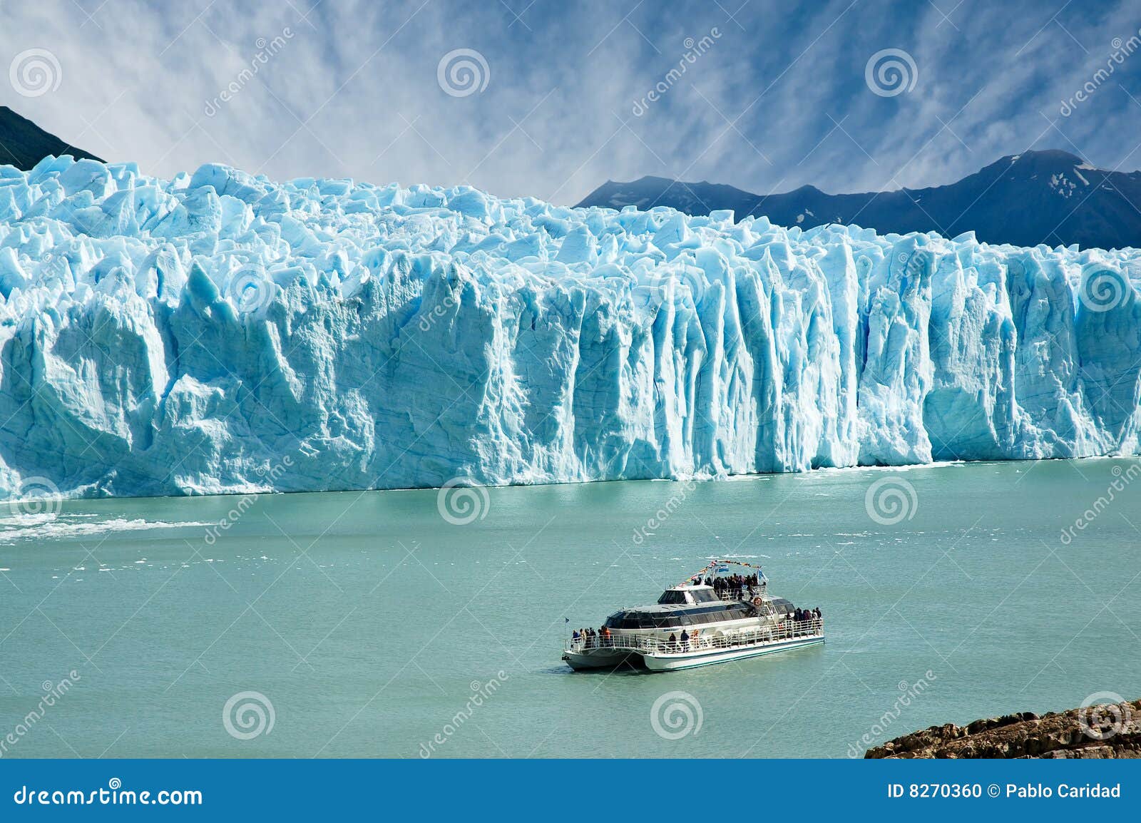 boat sailing near perito moreno glacier.