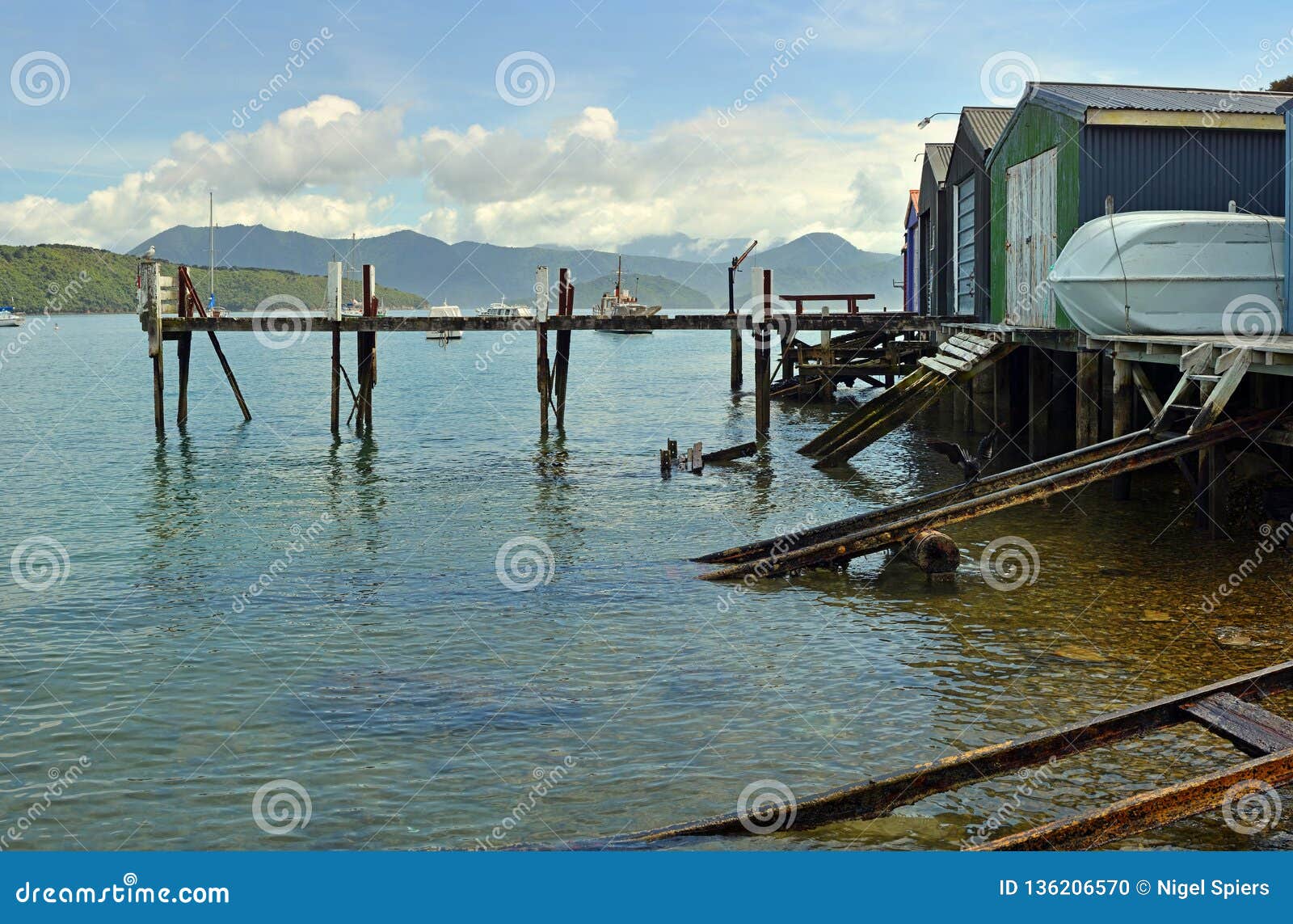 boat sheds and ramps at waikawa bay, picton, new zealand