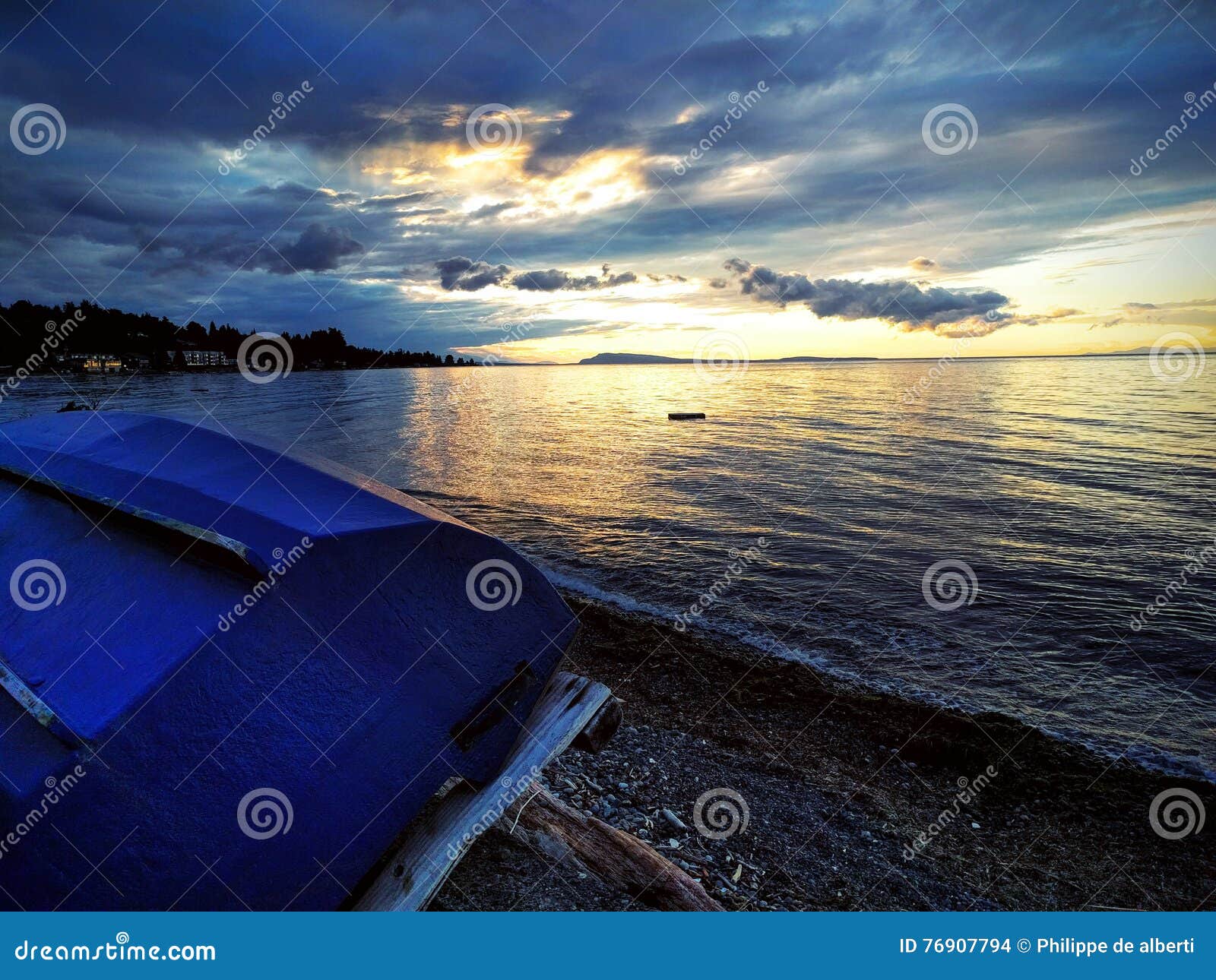 Boat and sunset stock photo. Image of beach, tide, boat 76907794