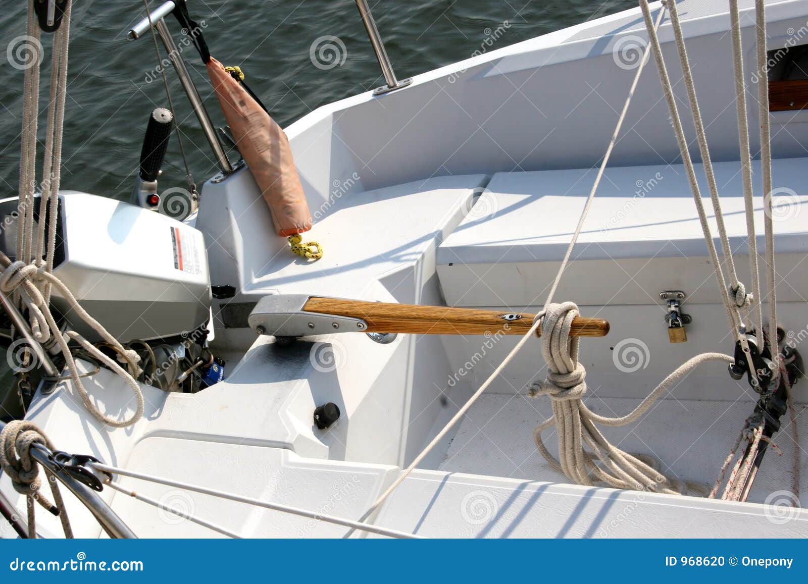 Tiller and other equipment in a sailing vessel.