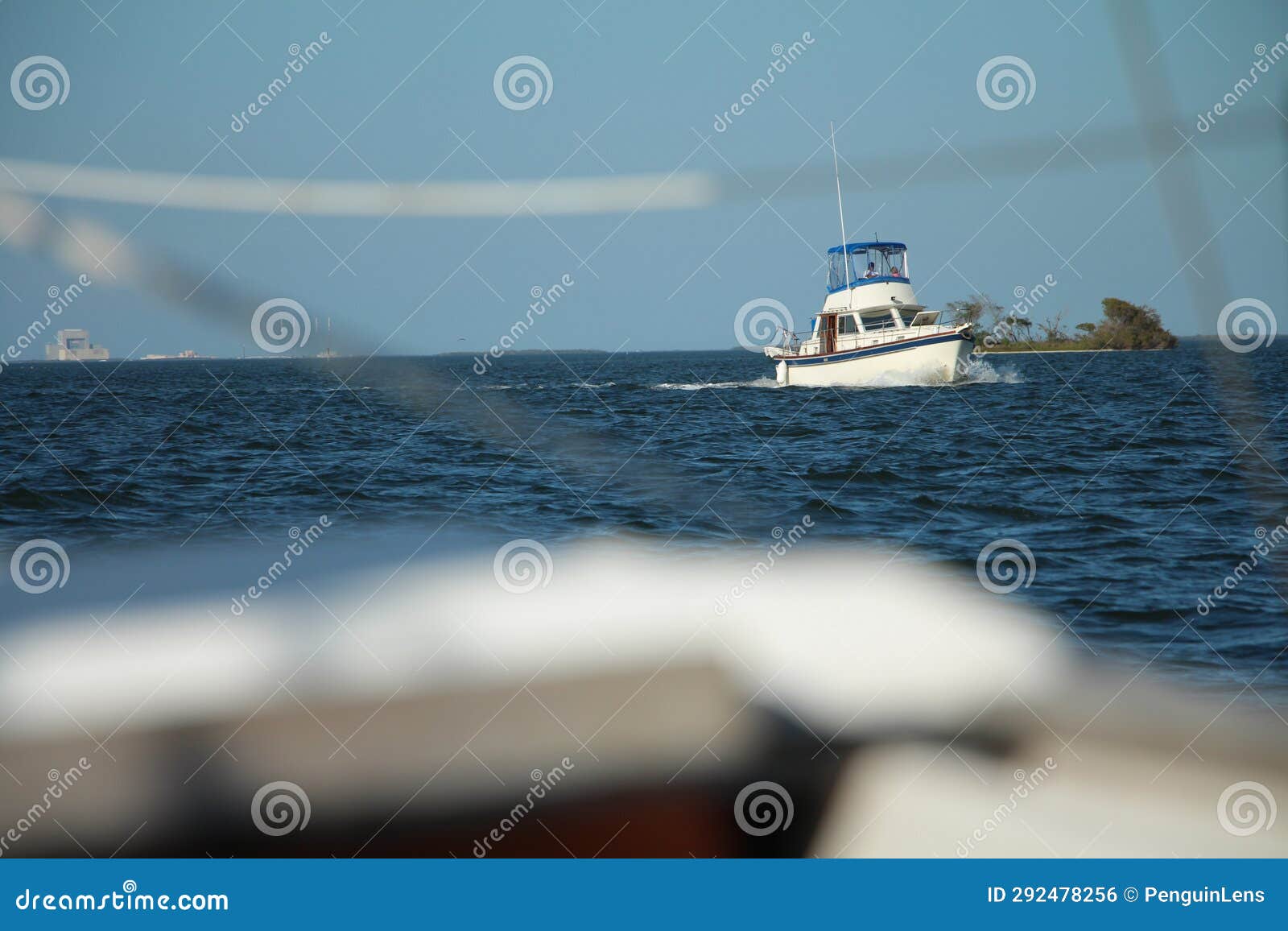 Boat Traveling on Water Approaching Shot from Another Boat 11 P Stock