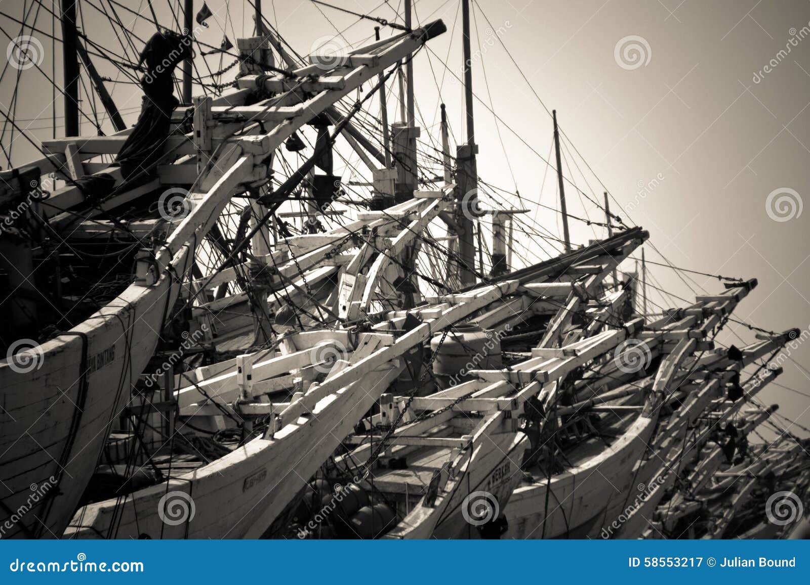 Boat and Workers of the Sunda Kelapa Harbour Jakarta, Indonesia