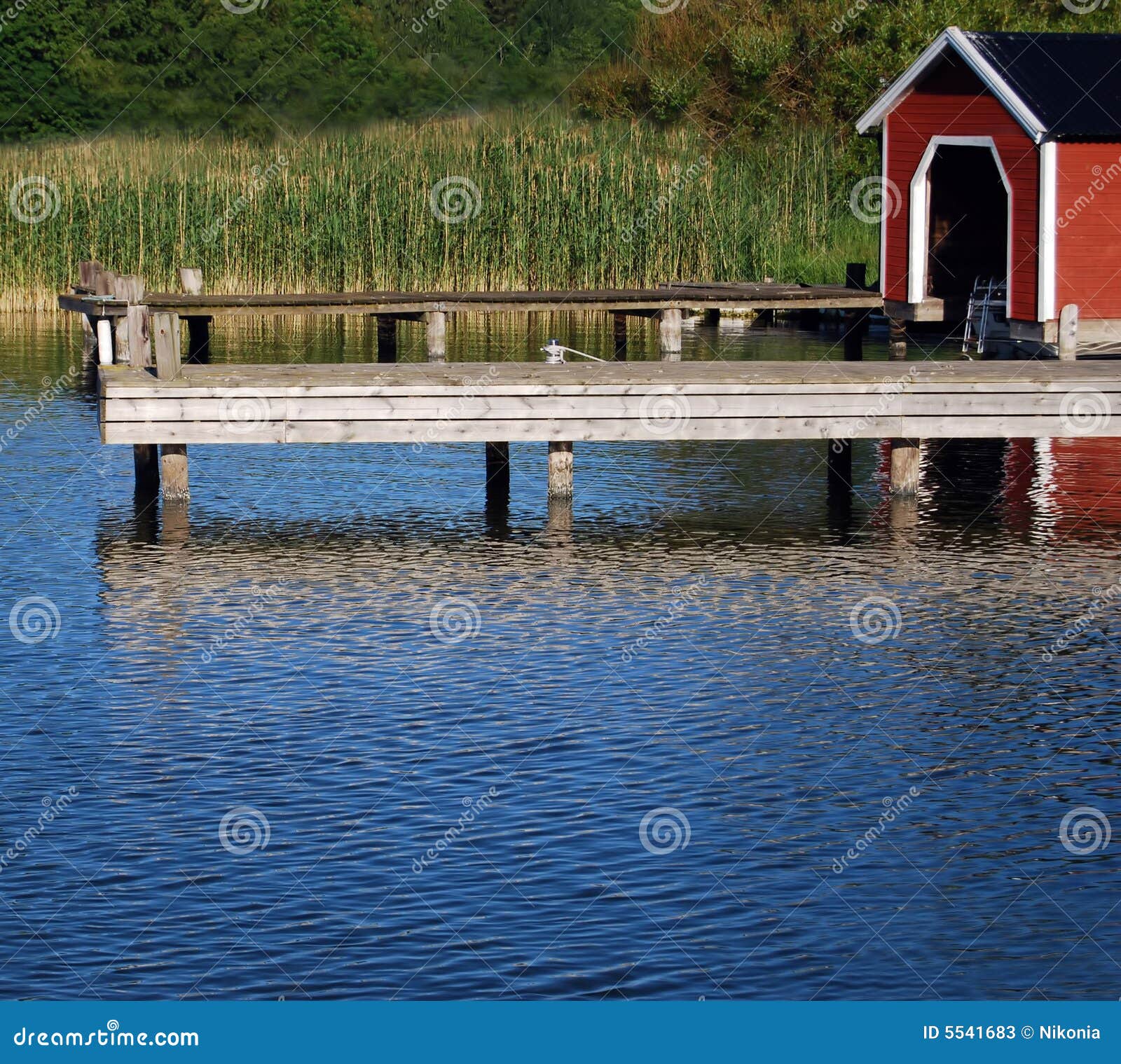 Boathouse stock image. Image of water, white, bush, tree 5541683