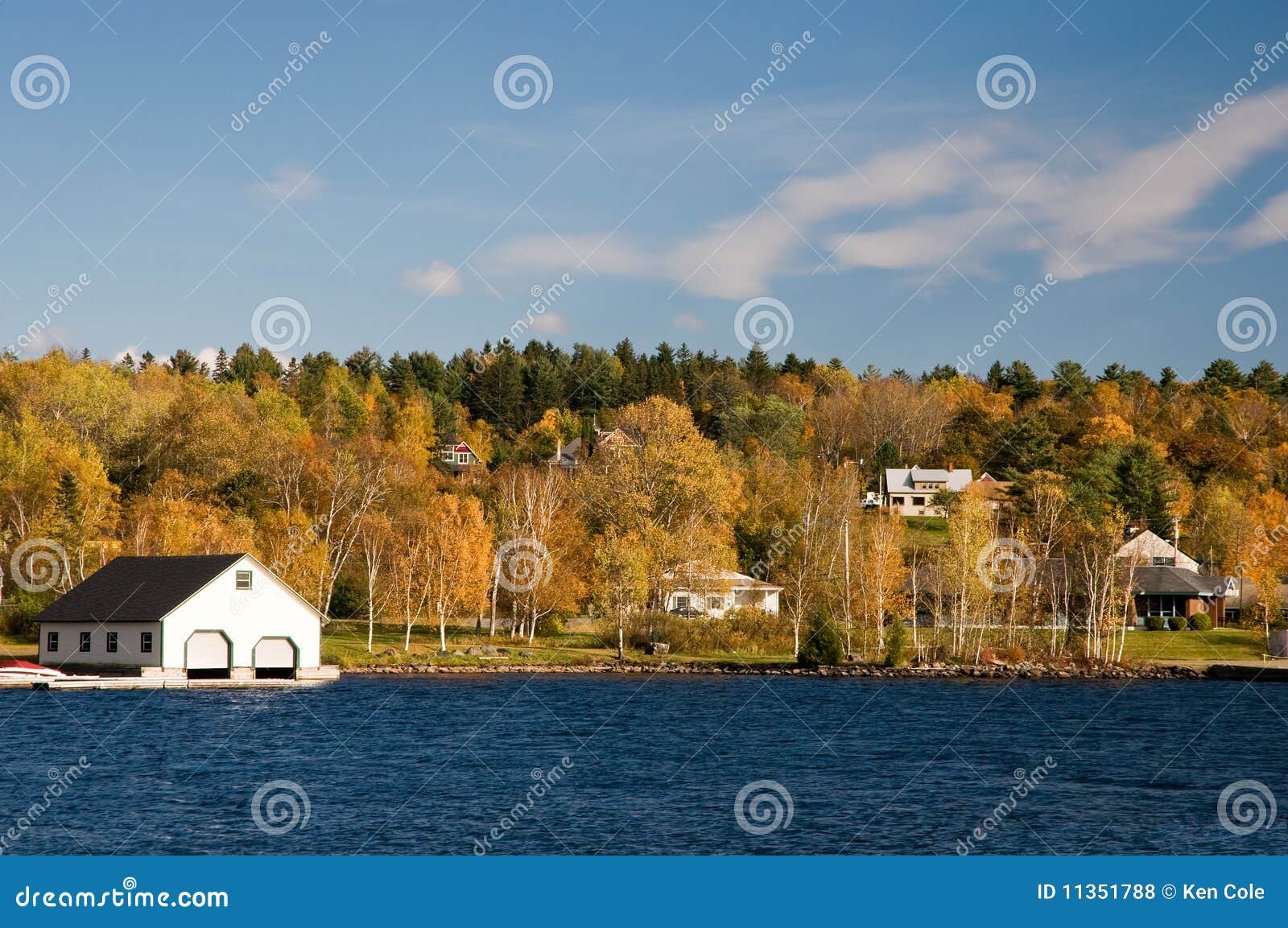 boathouse on lake in fall