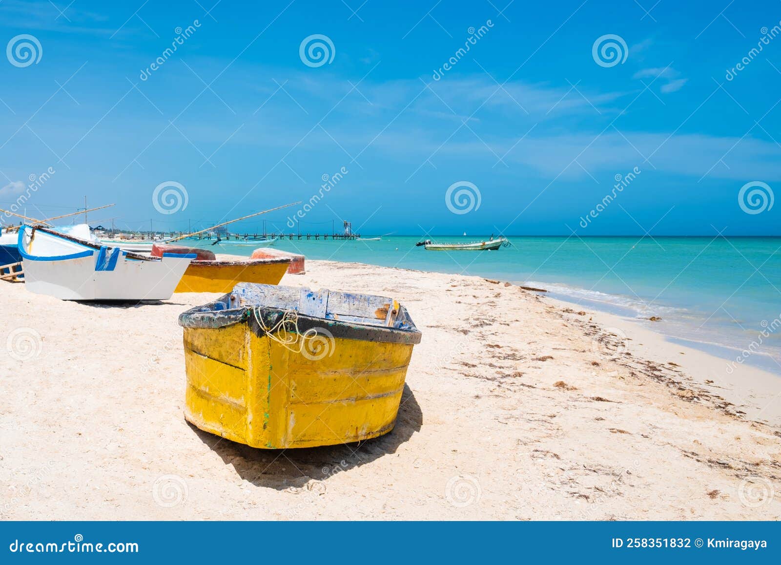 boats at the beach of progreso near merida in mexico