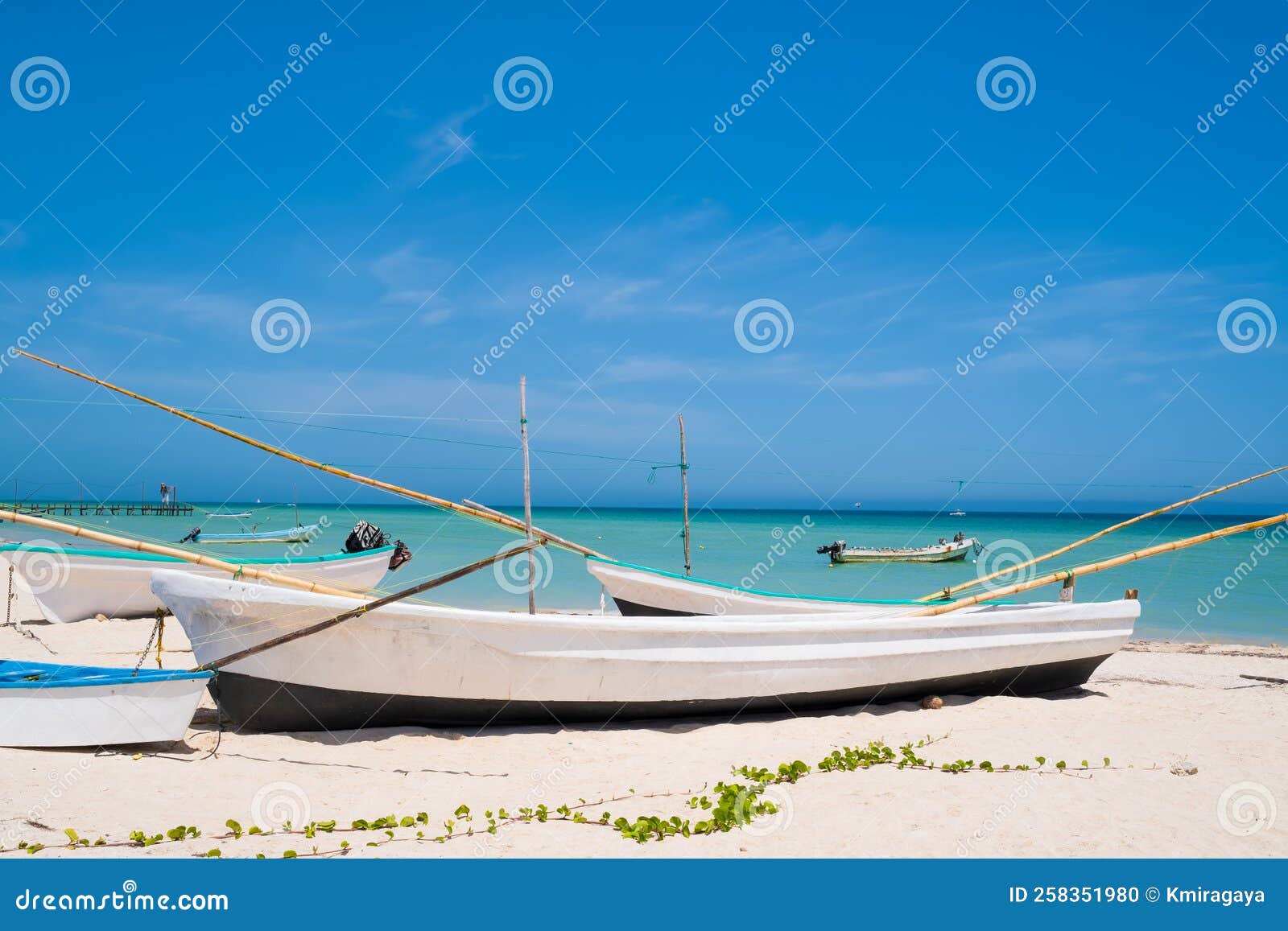 boats at the beach of progreso near merida in mexico