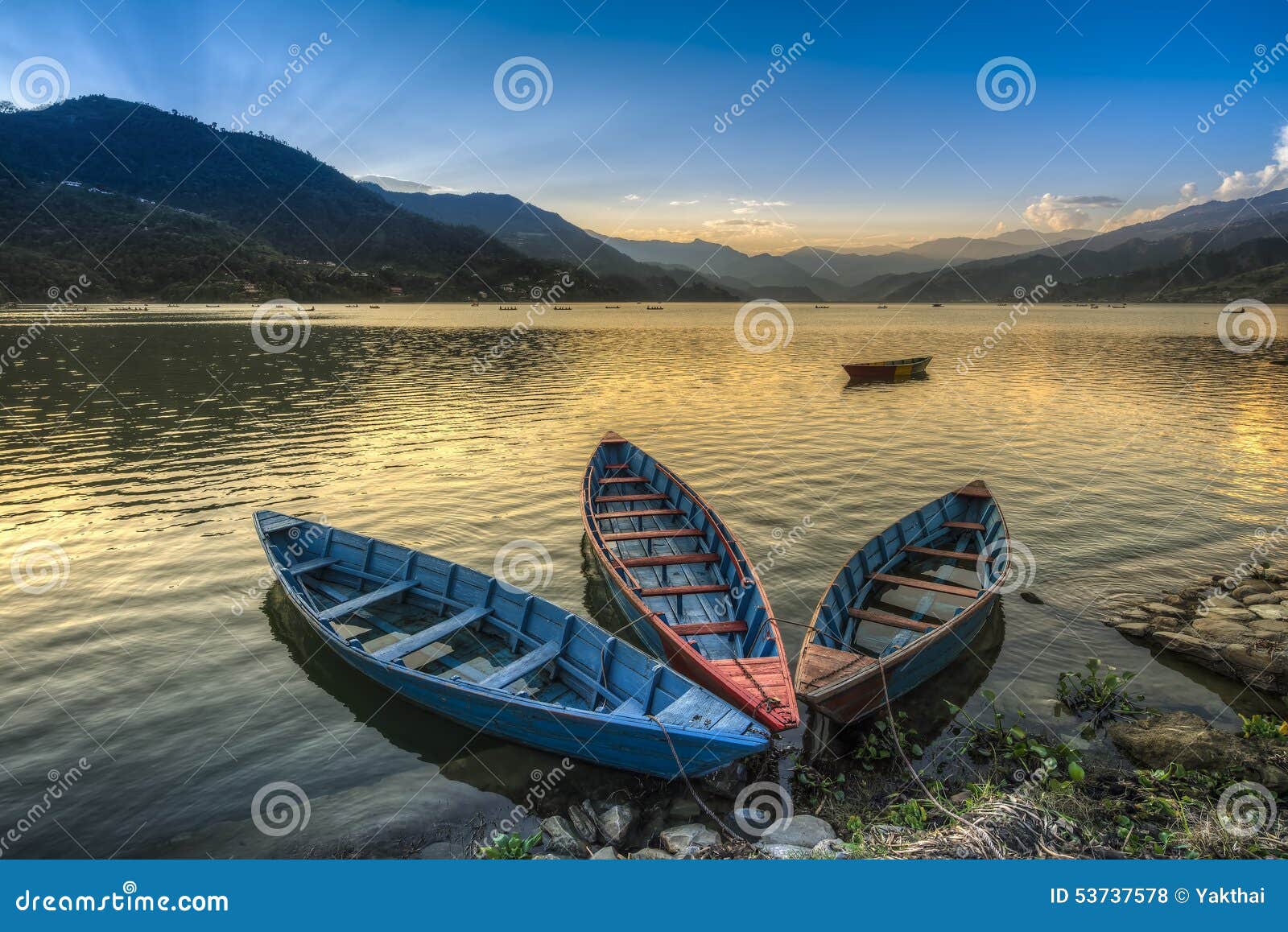boats on fewa lake in pokhara, nepal