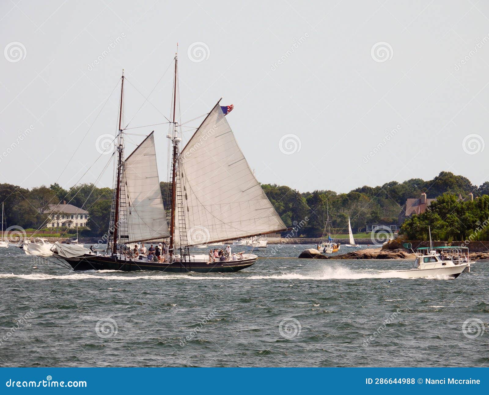 Schooner Sails in Busy Gloucester Harbor Cape Ann Massachusetts