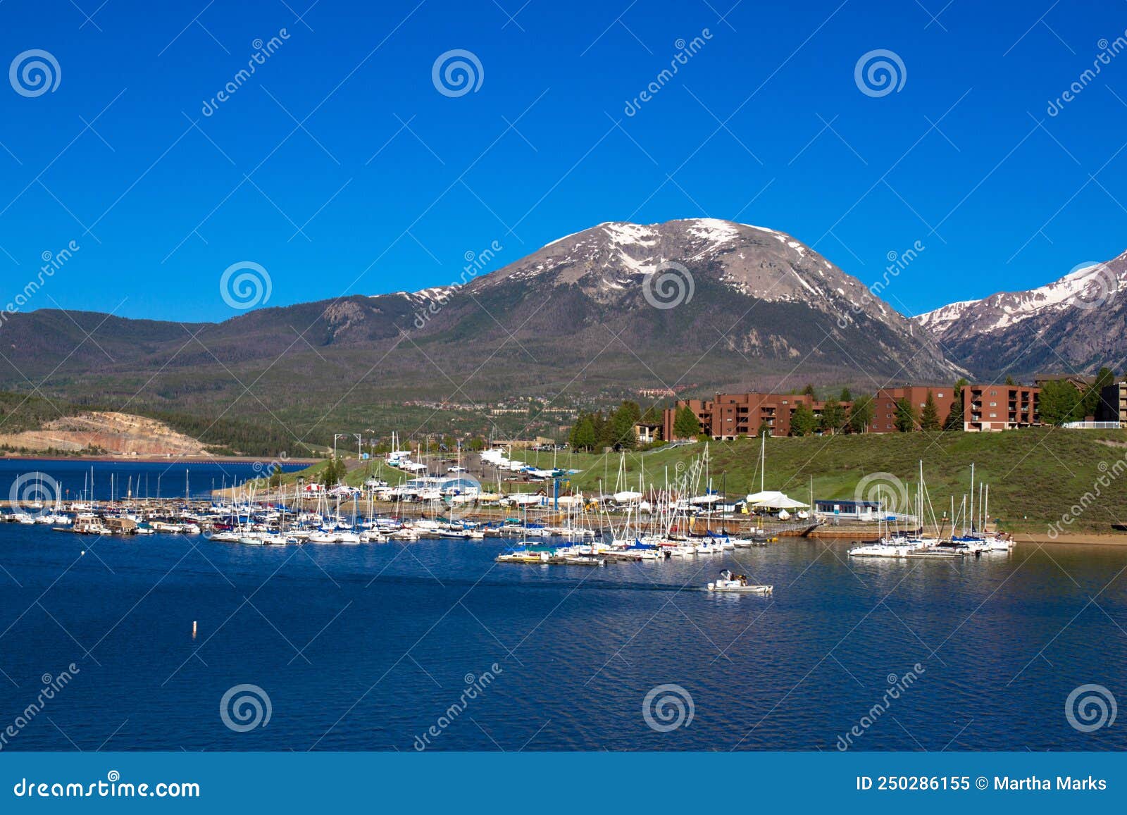 marina and rocky mountain peaks at dillon reservoir
