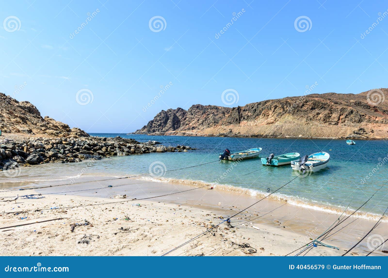 boats in small harbor near sadh, dhofar (oman)