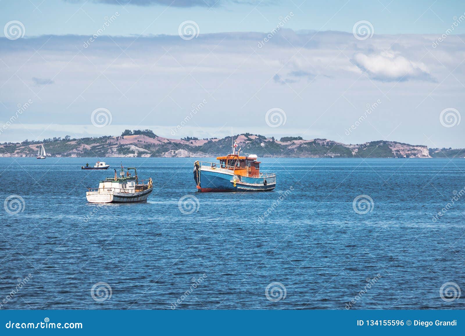 boats at tenaun bay - tenaun, chiloe island, chile