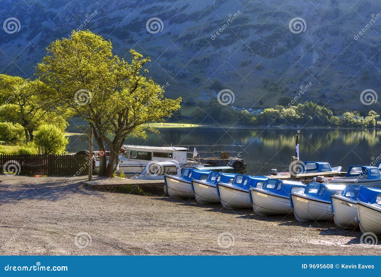 Boats on Ullswater shore stock photo. Image of destination 9695608