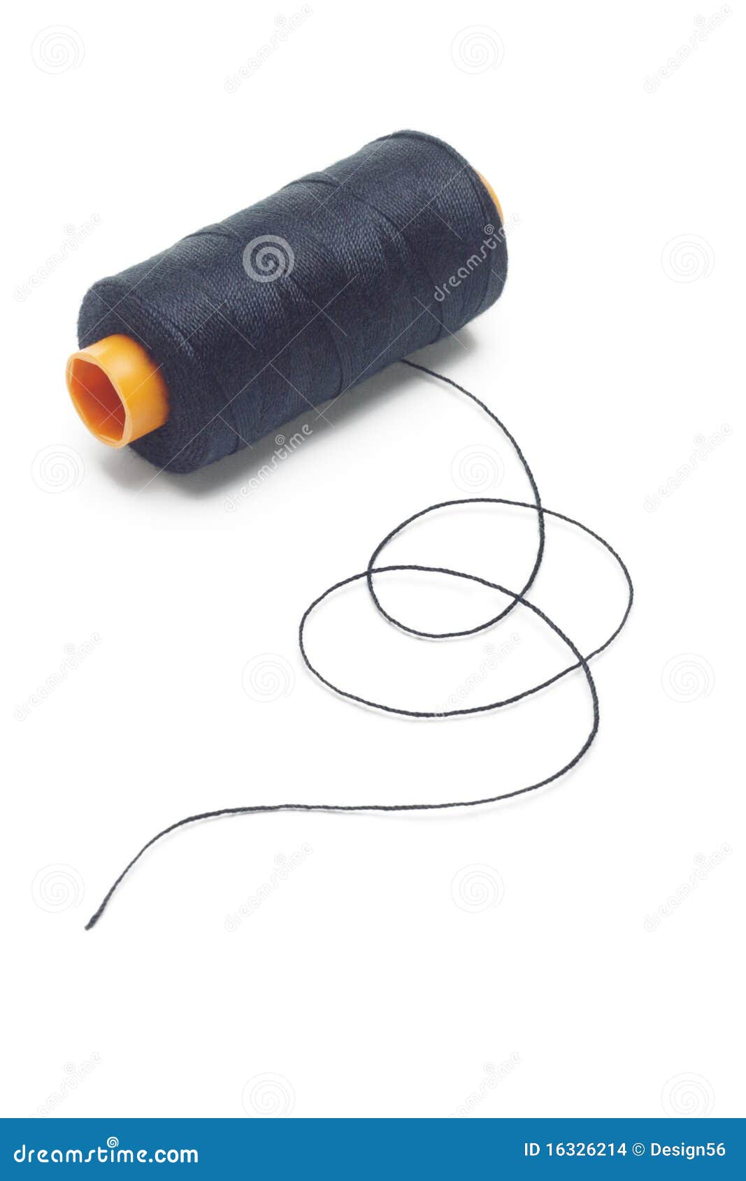 Needle and Bobbin with Black Thread on Black Background Stock