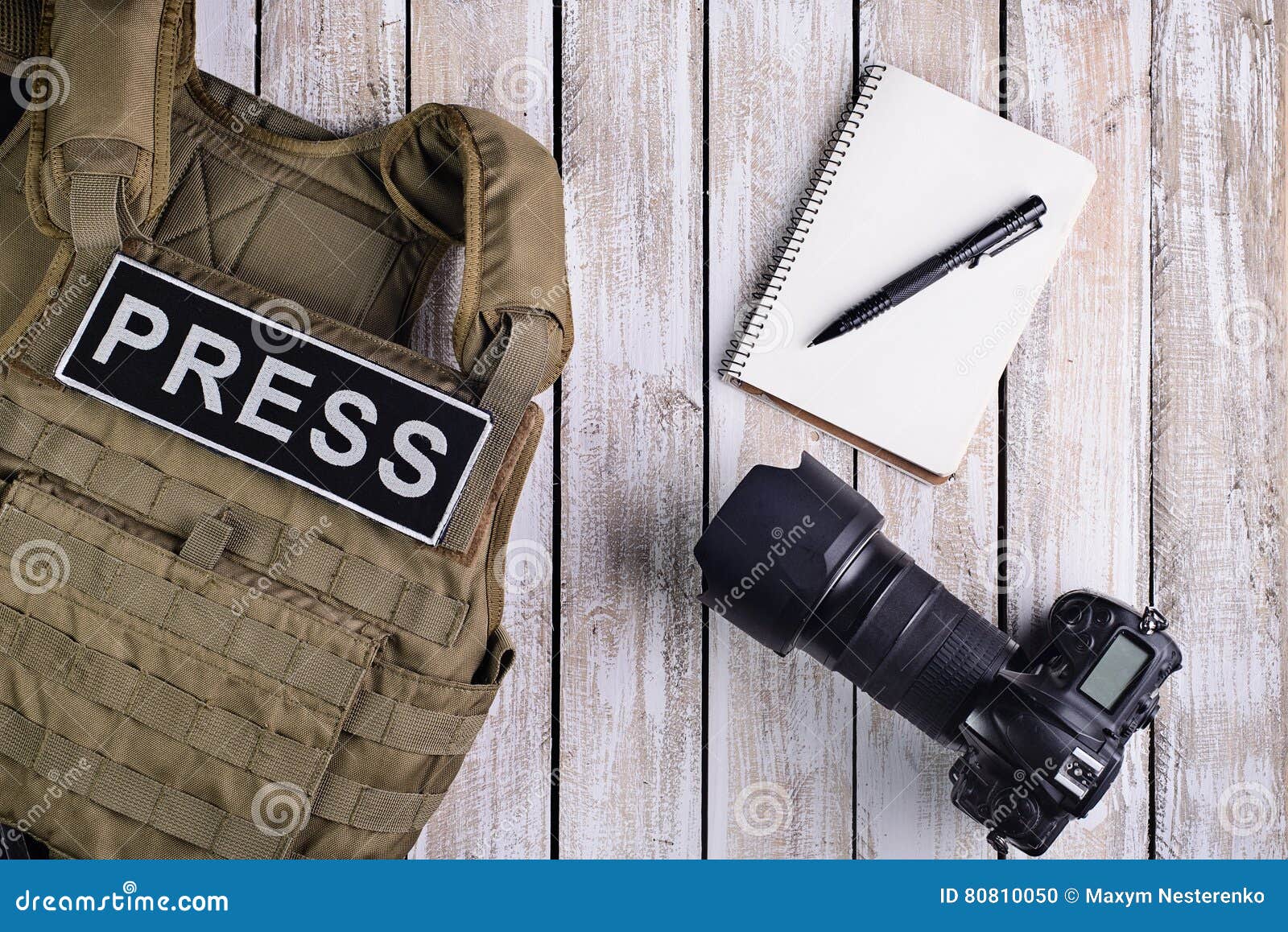 body armor for journalist, notebook and camera