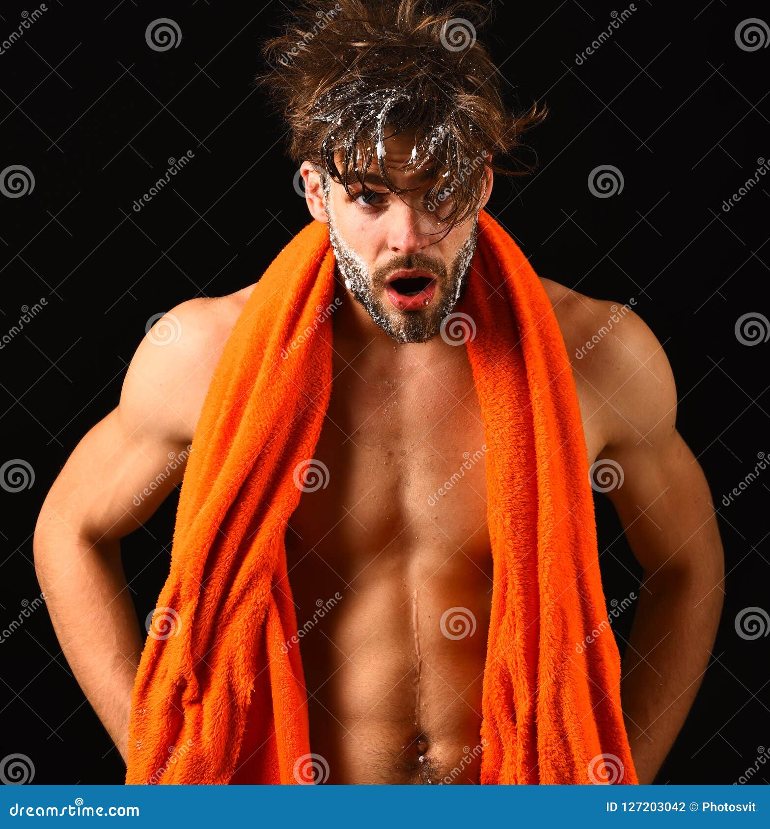 Macho Attractive Nude Guy Hold Blackboard. Man With Beard And Tousled