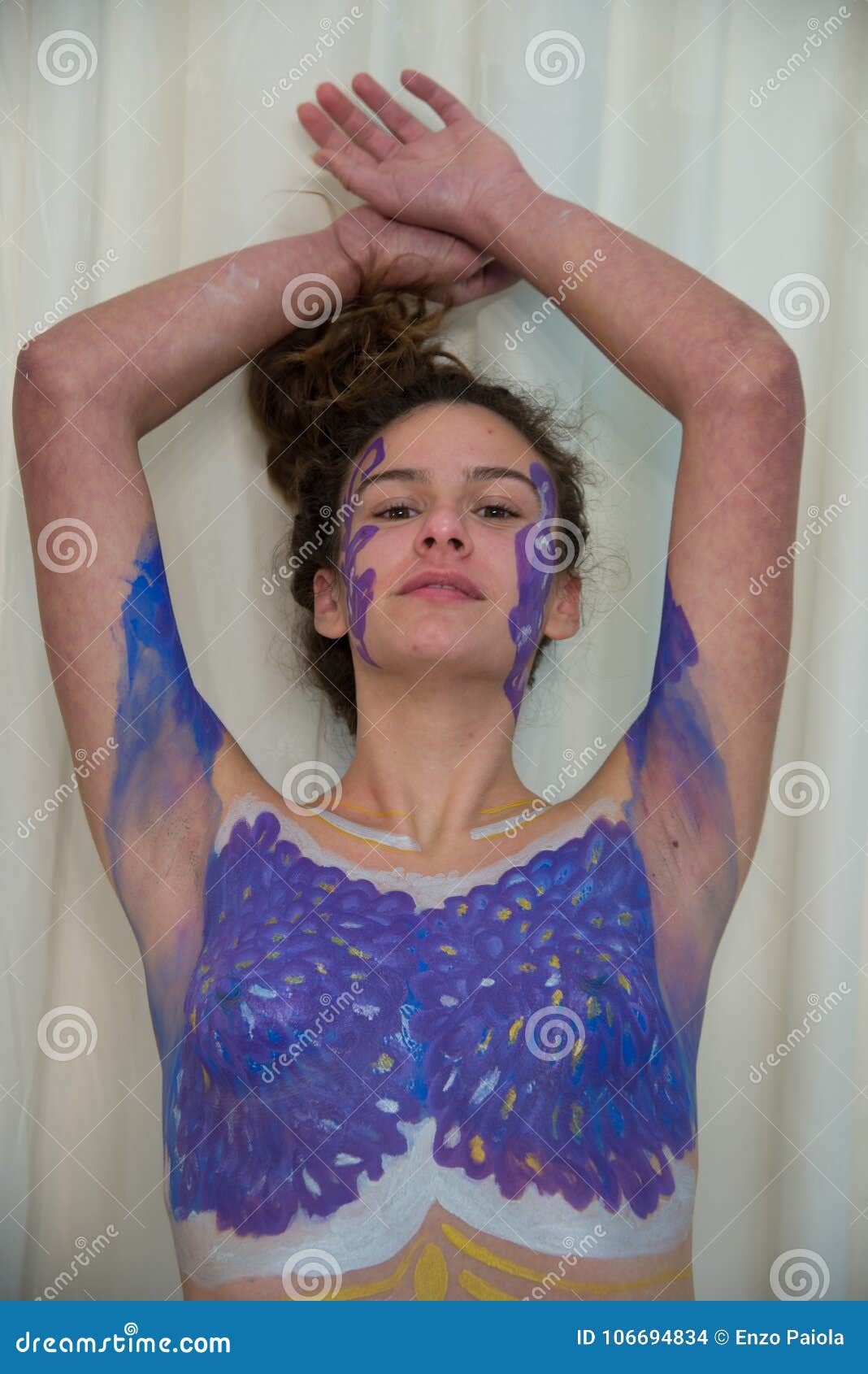 Beautiful young woman with decollete painted with electric blue body paint  stock photo (279338) - YouWorkForThem