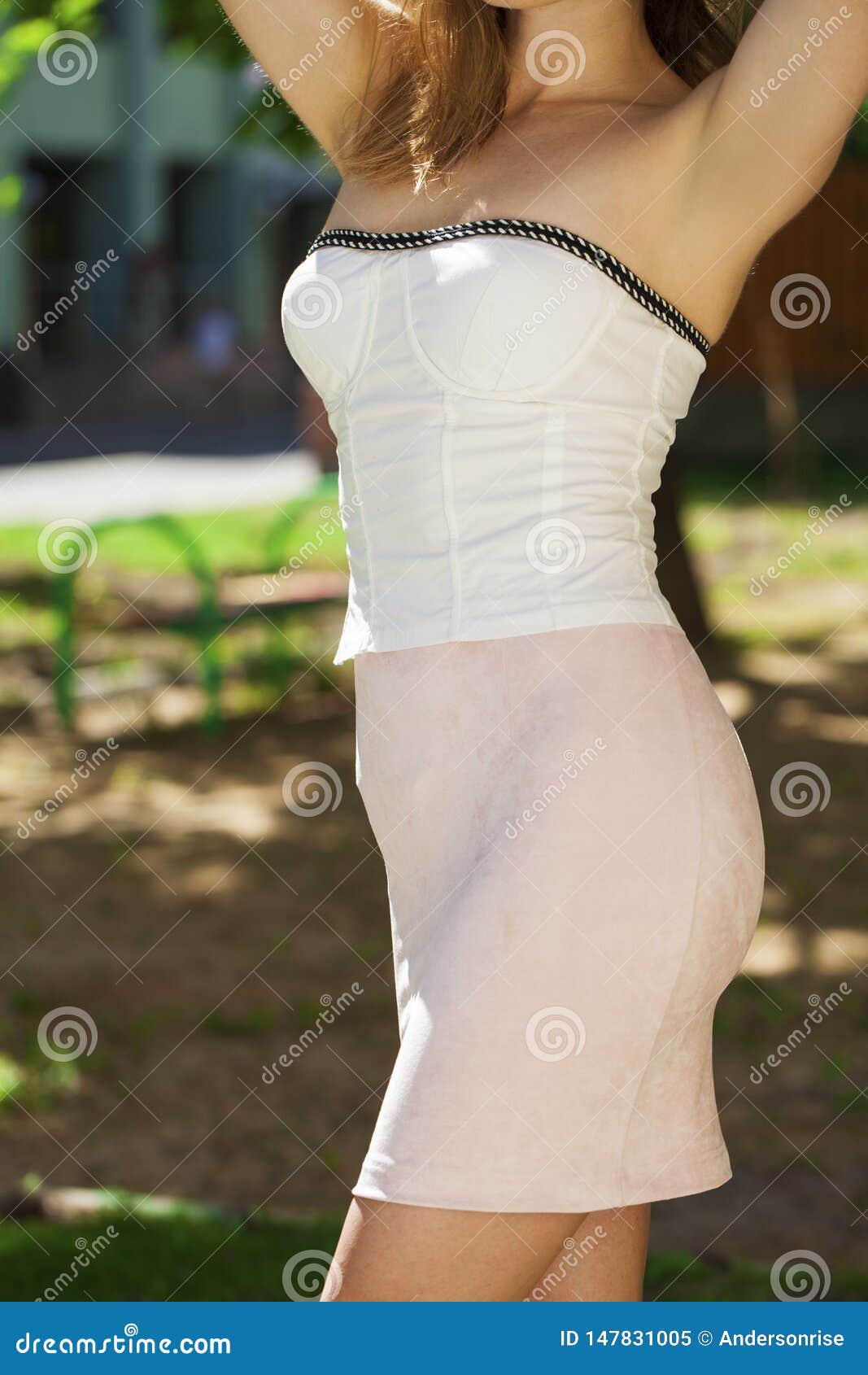 Body part white corset and pink skirt. Fashion street - summer outdoors