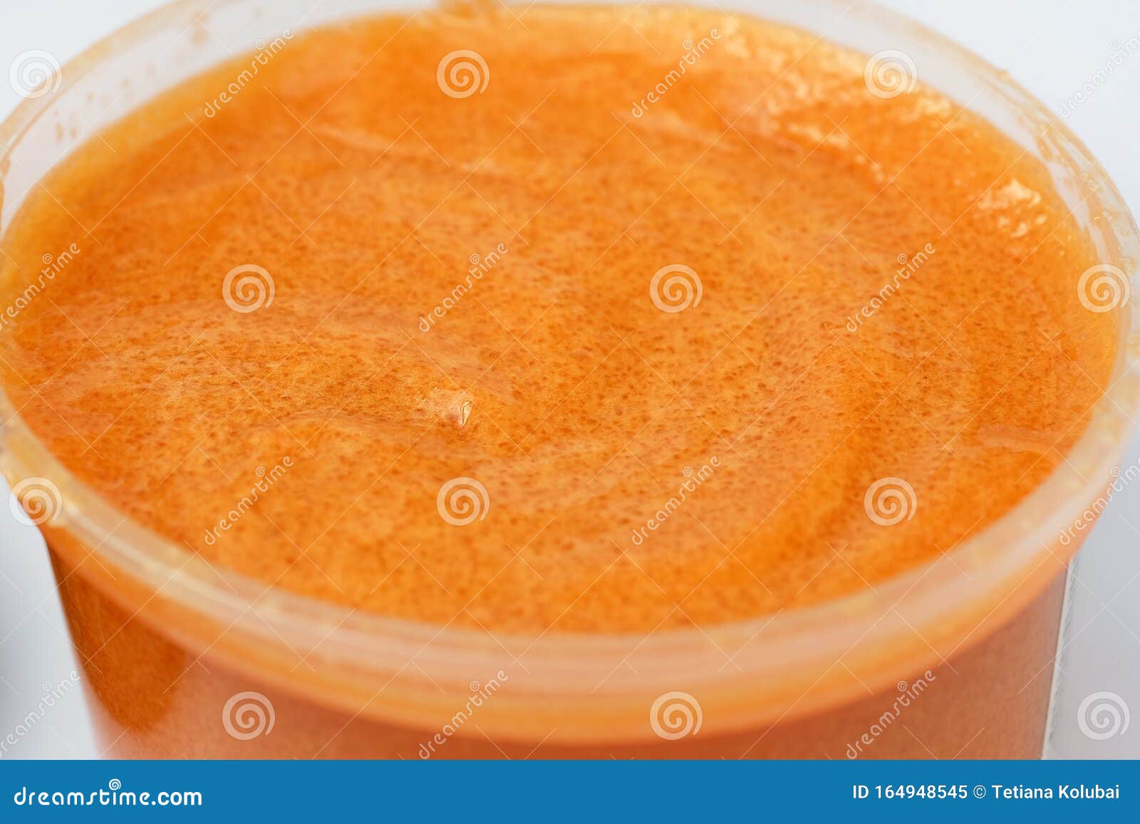 Body Scrub in a Plastic Container. Stock Image Image of cane