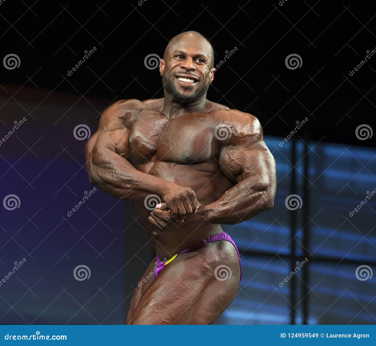 Handsome Topless Male Bodybuilder Doing Classic Double Biceps Pose, Looking  To A Side, Isolated On White Stock Photo, Picture and Royalty Free Image.  Image 53444318.