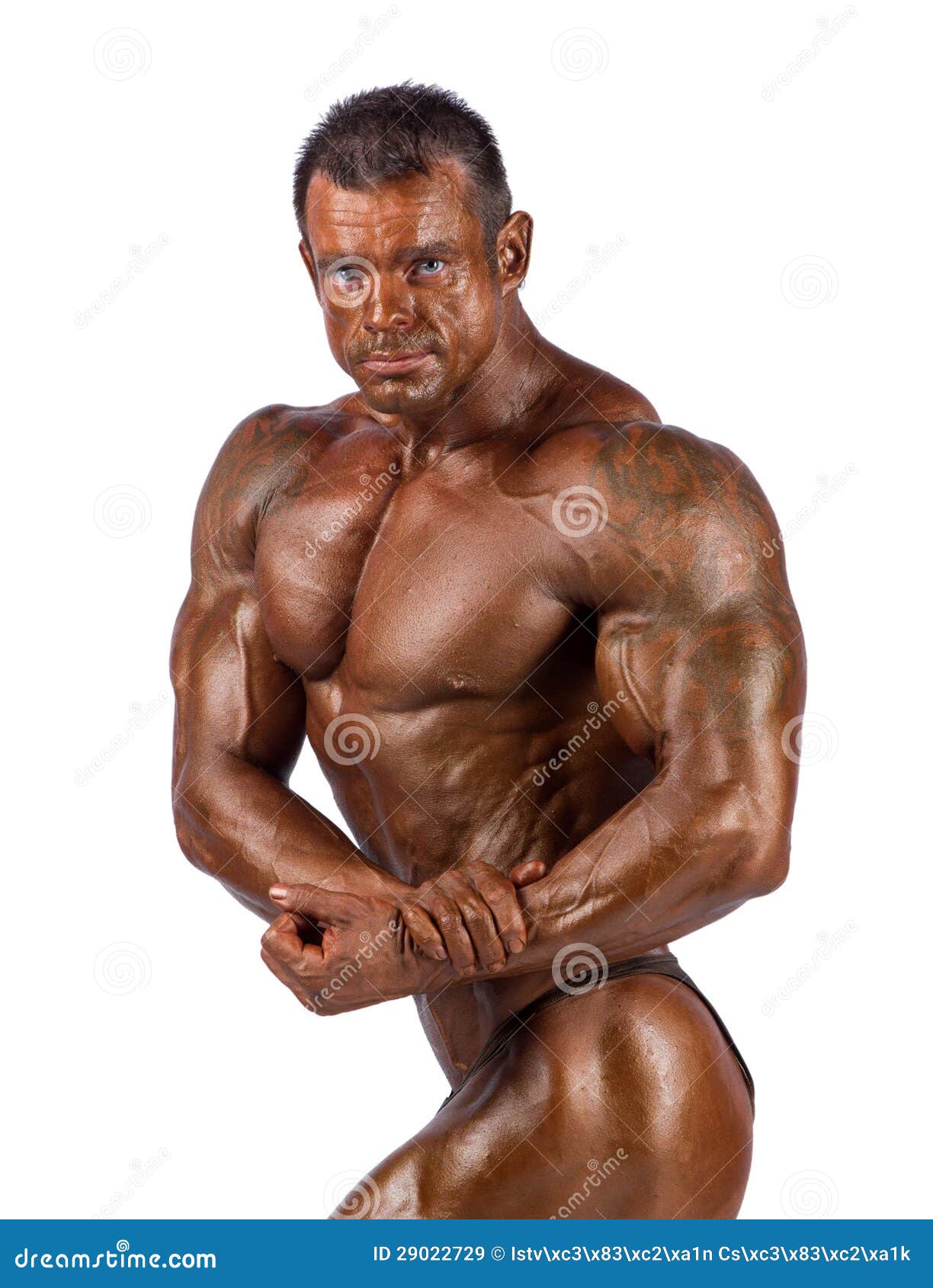 Bodybuilder flexing stock image. Image of attractive 29022729