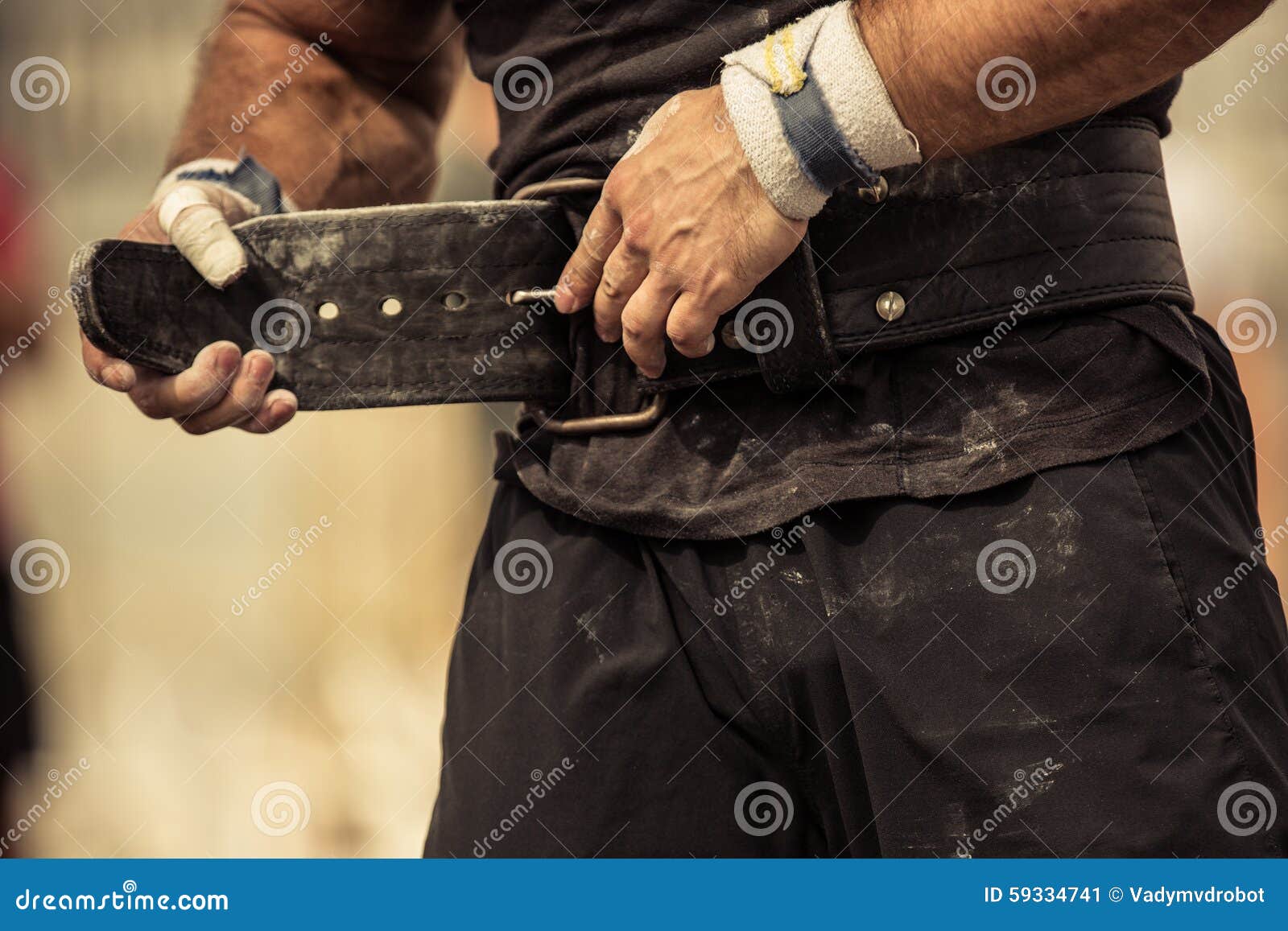 Bodybuilder Girding on His Bodybuilding Belt Stock Image - Image of