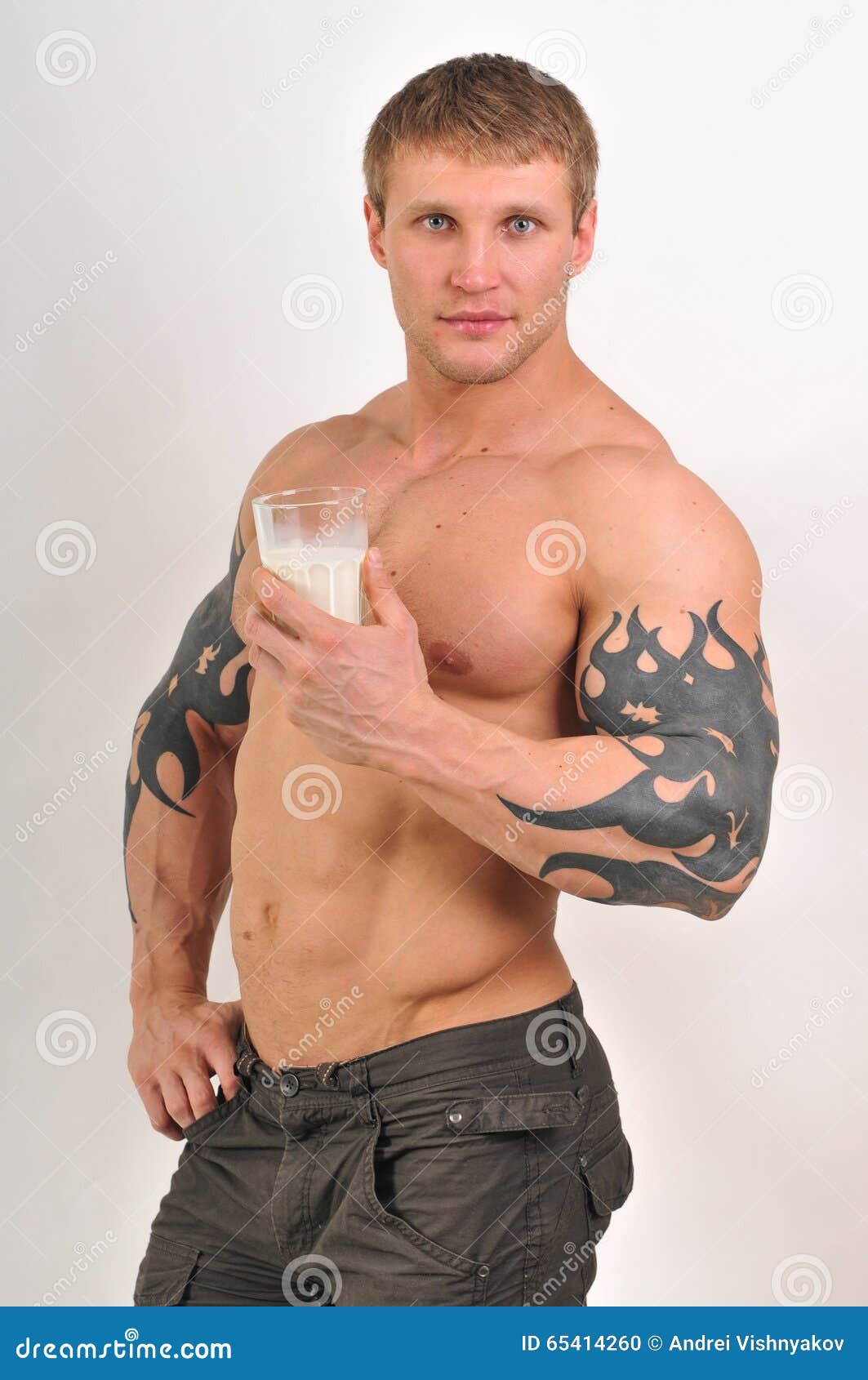 Bodybuilder with milk stock photo. Image of apple, happiness 65414260