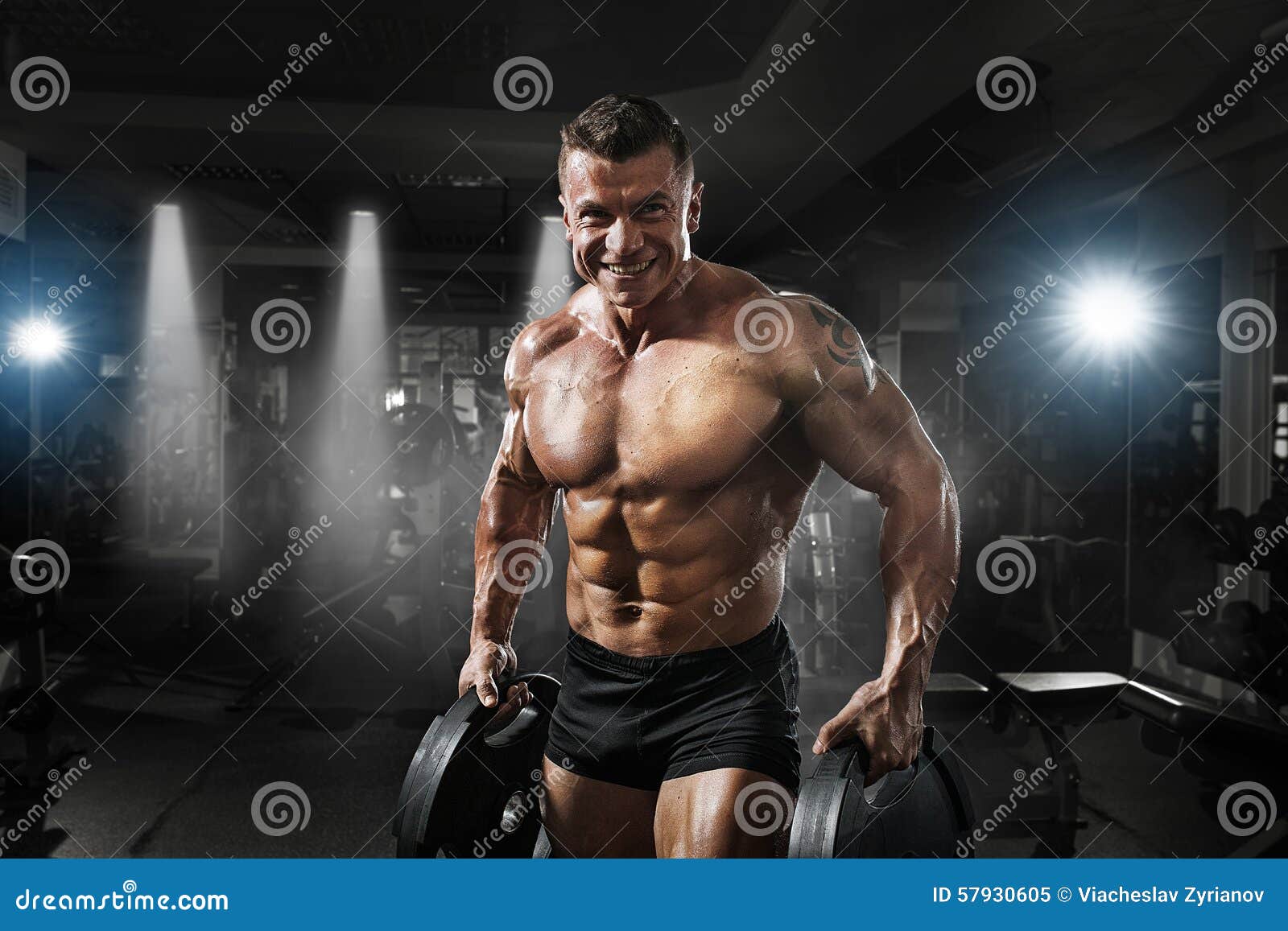Bodybuilder Muscle Athlete Training with Weight in Gym Stock Image