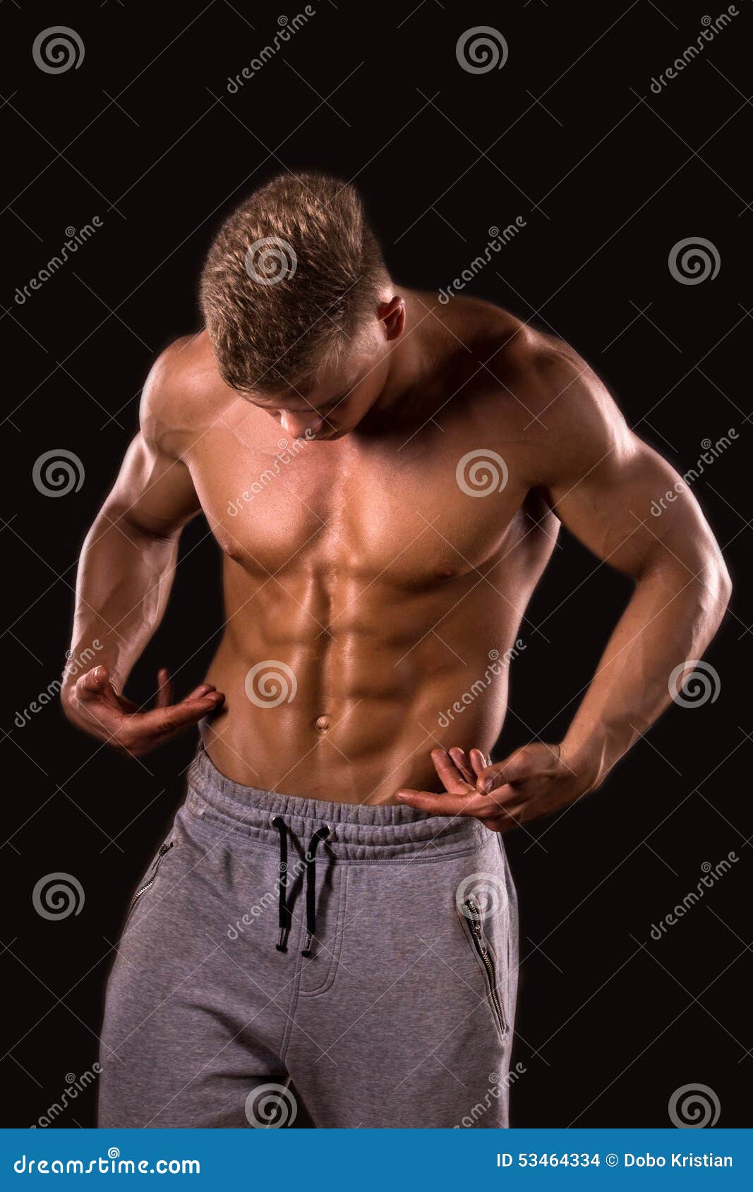 Bodybuilder is Showing His Abdominal Muscle Stock Photo Image of