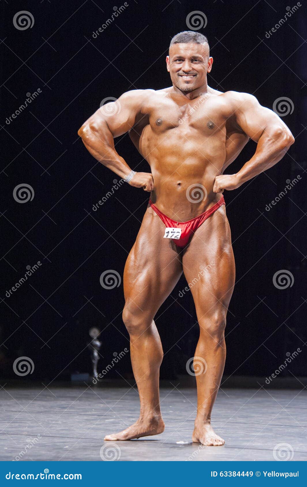 Bodybuilder Shows His Front Lats Spread Pose on Stage Editorial Stock Image  - Image of champion, hamstring: 63384449