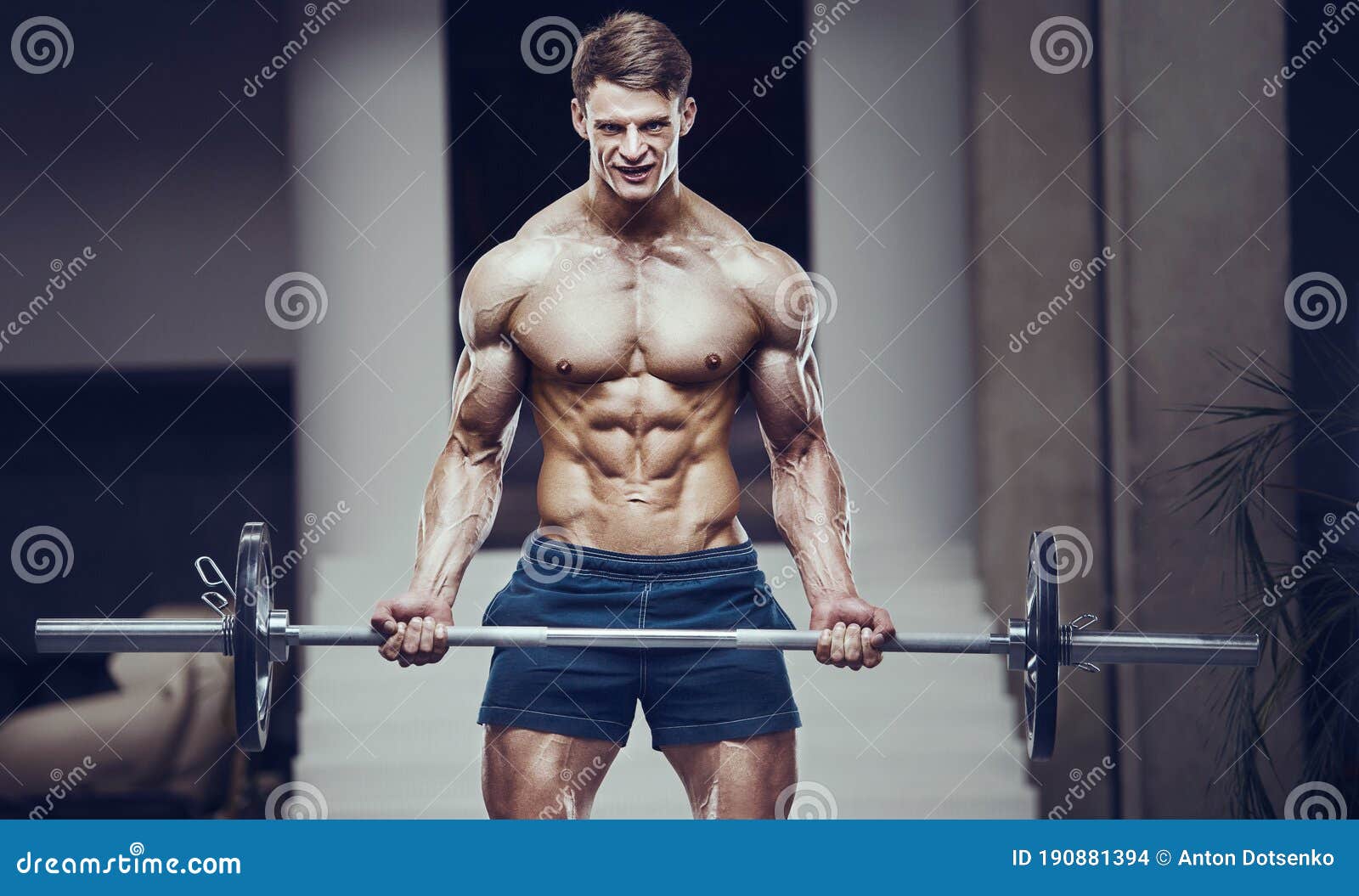 Bodybuilder Strong Man Pumping Up Biceps Muscles Stock Photo Image Of